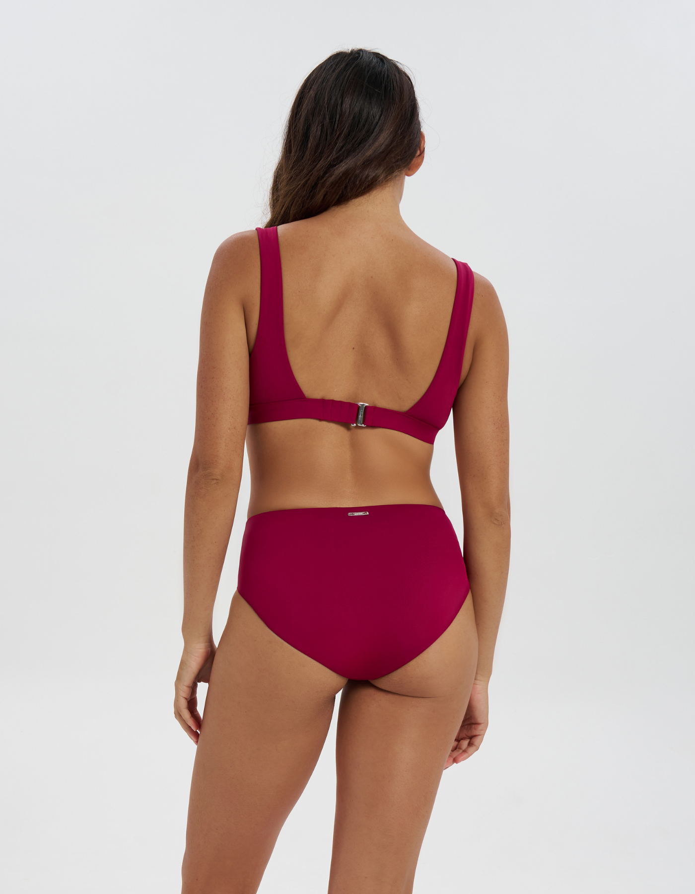 Mid Waist Plum Womens Bikini Bottoms, back view. Sustainable womens swimwear.