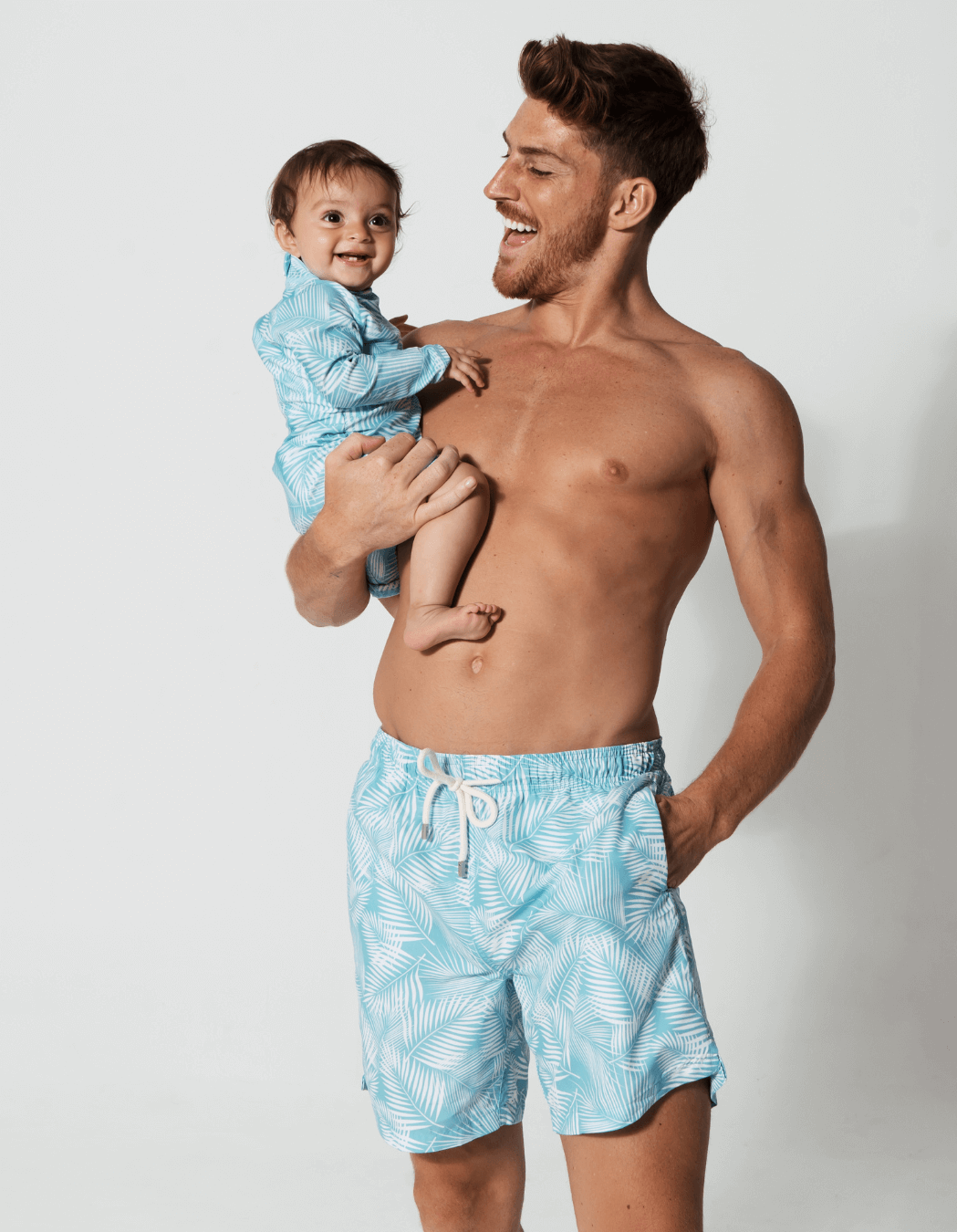 Father & Baby Green Fern, front view. Father and son matching swim shorts.