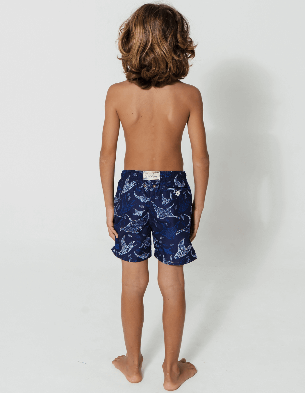 Ocean Manta Boys Swim Shorts, back view. Sustainable boys swimwear.