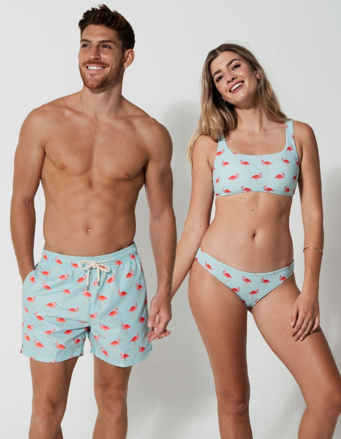 His & Hers Pink Flamingo, front view. Family matching swimwear.