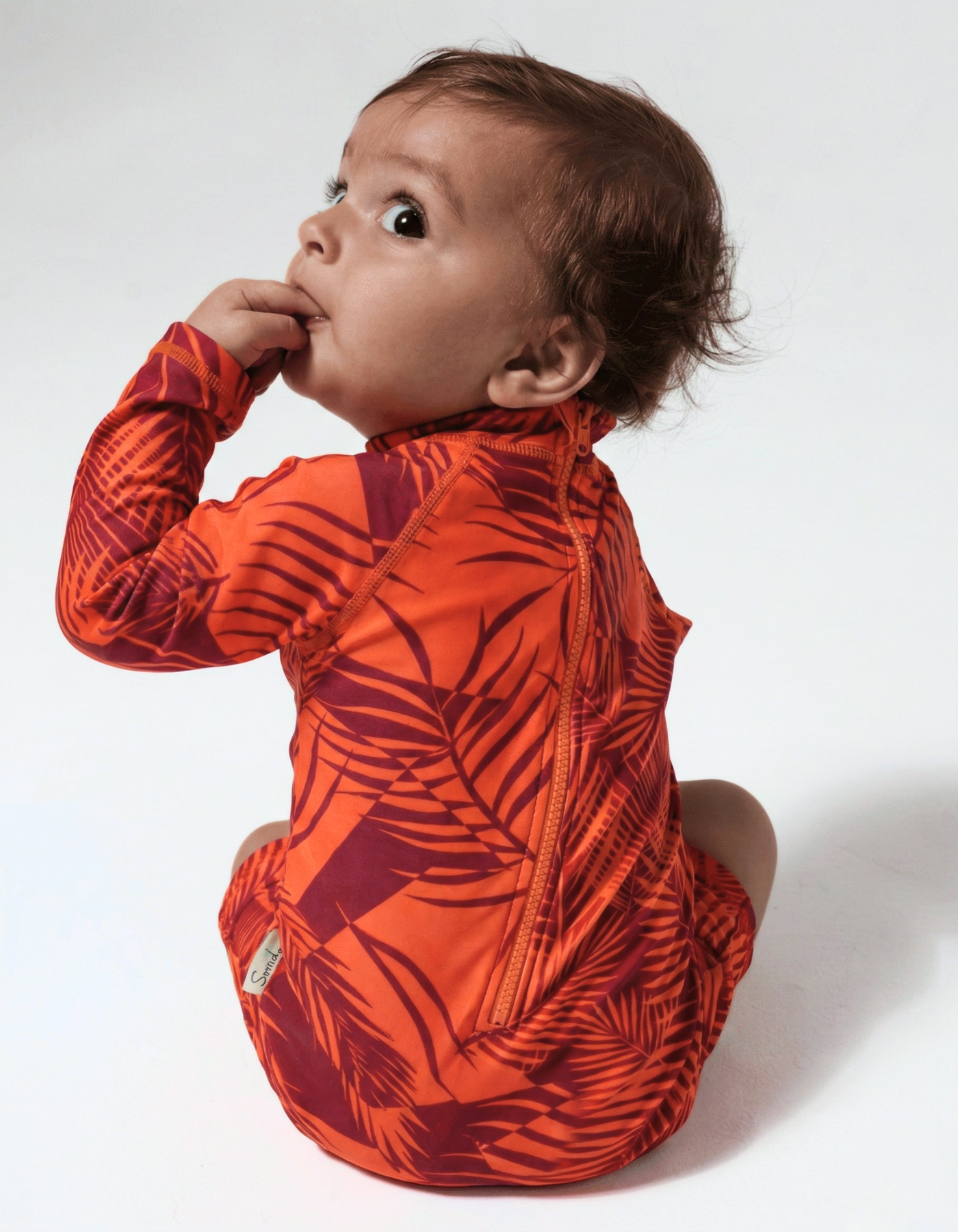 Sunset Palm Baby Swimsuit, back view. Sustainable baby swimwear.