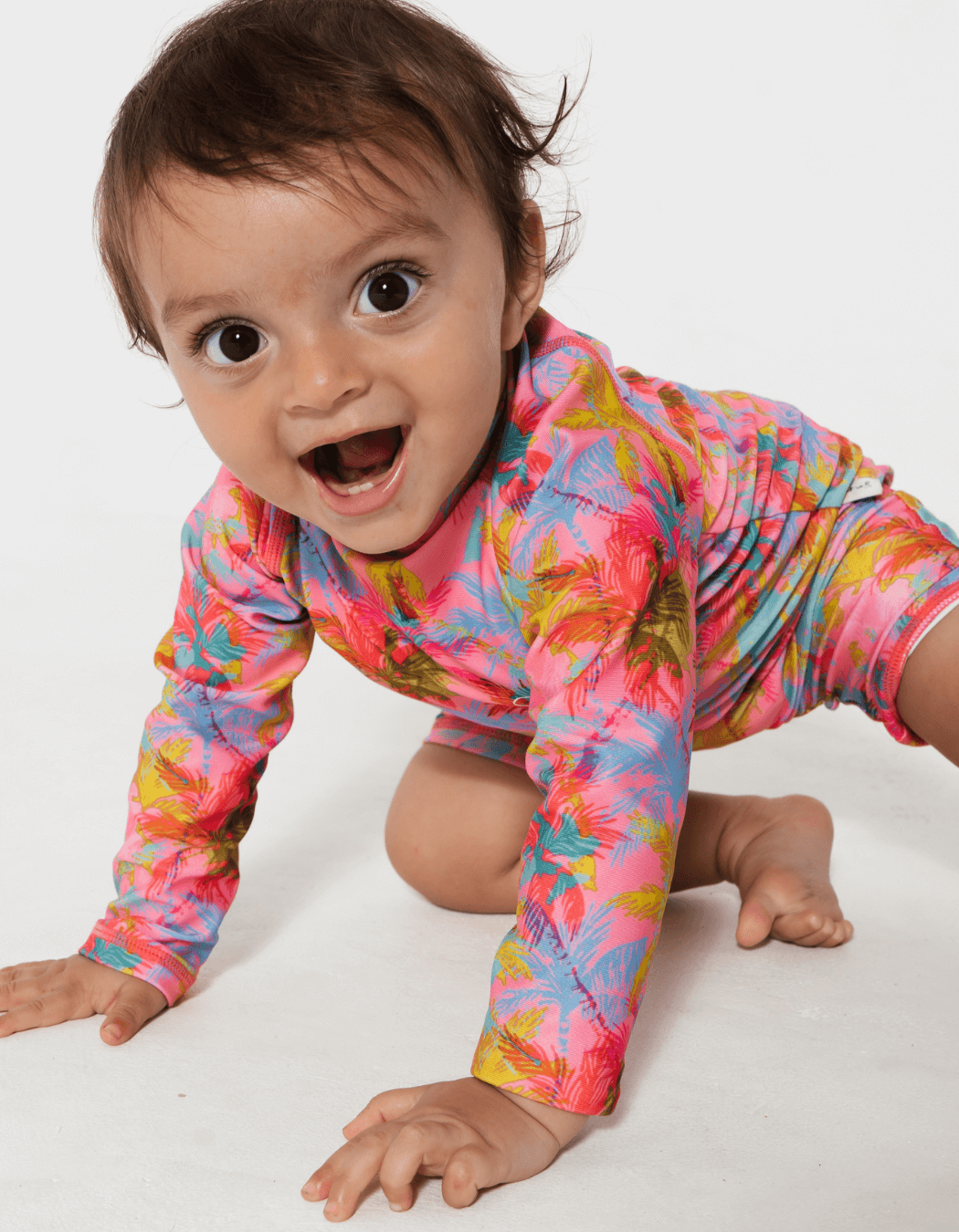 Father & Baby Pink Palm, back view. Father and son matching swim shorts.