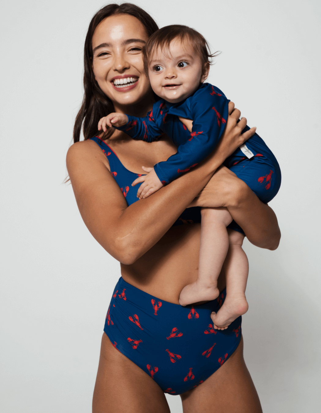 Mother & Baby Swimwear Red Lobster, front view. Sustainable baby swimwear.