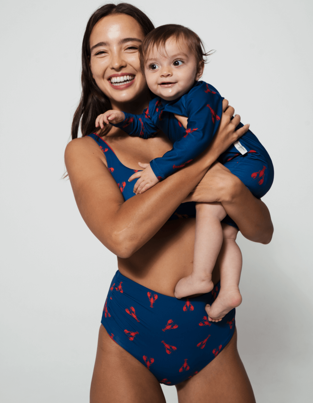 Mother & Baby Swimwear Red Lobster, front view. Sustainable baby swimwear.