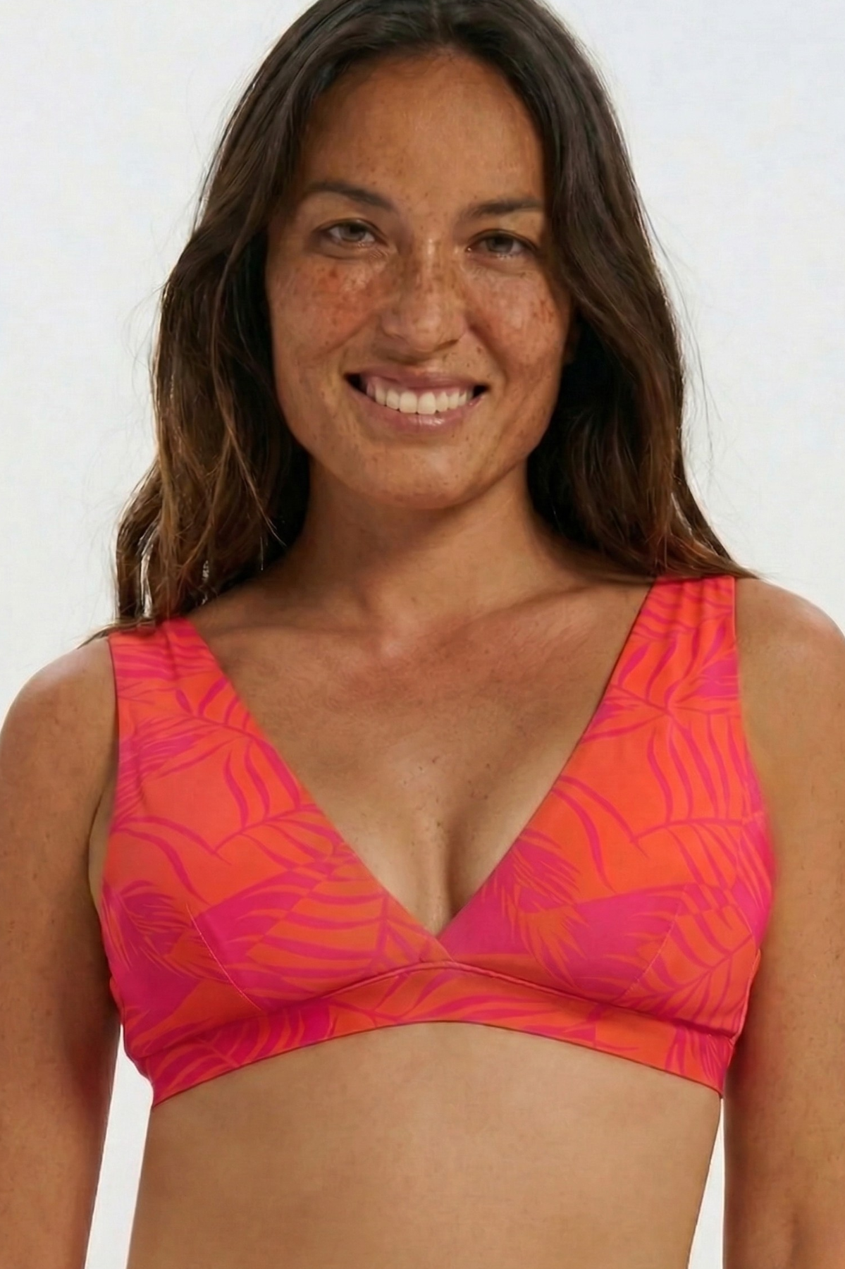 Dune – Aperol Palm Womens Plunge Bikini Top, front view. Sustainable womens swimwear.