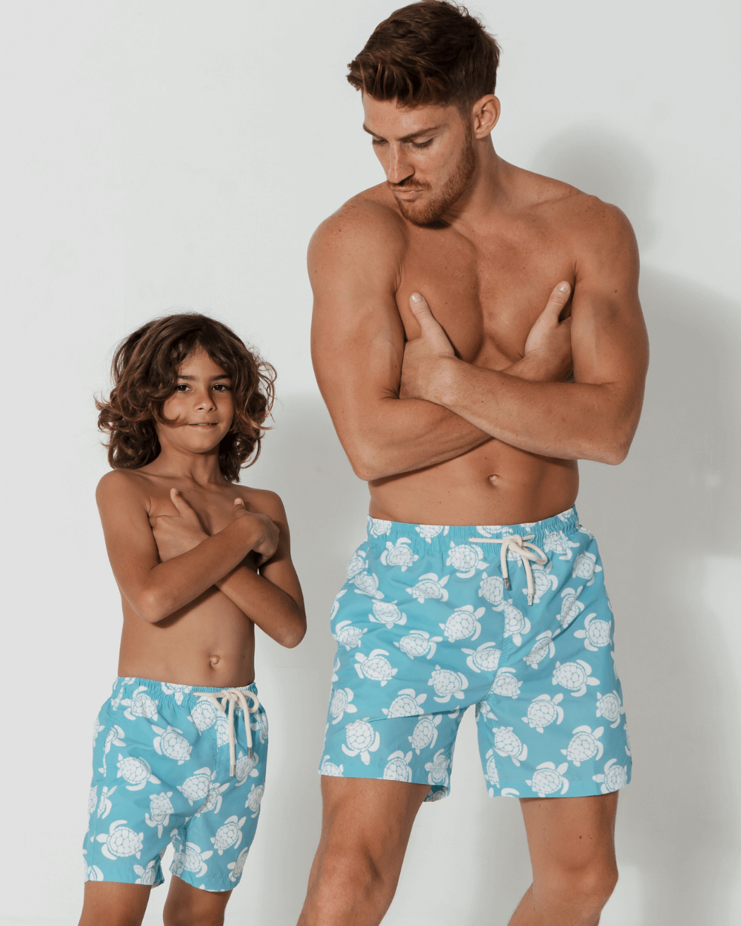 Father & Son Swim Shorts Maldives Blue Turtle, front view. Father and son matching swim shorts.