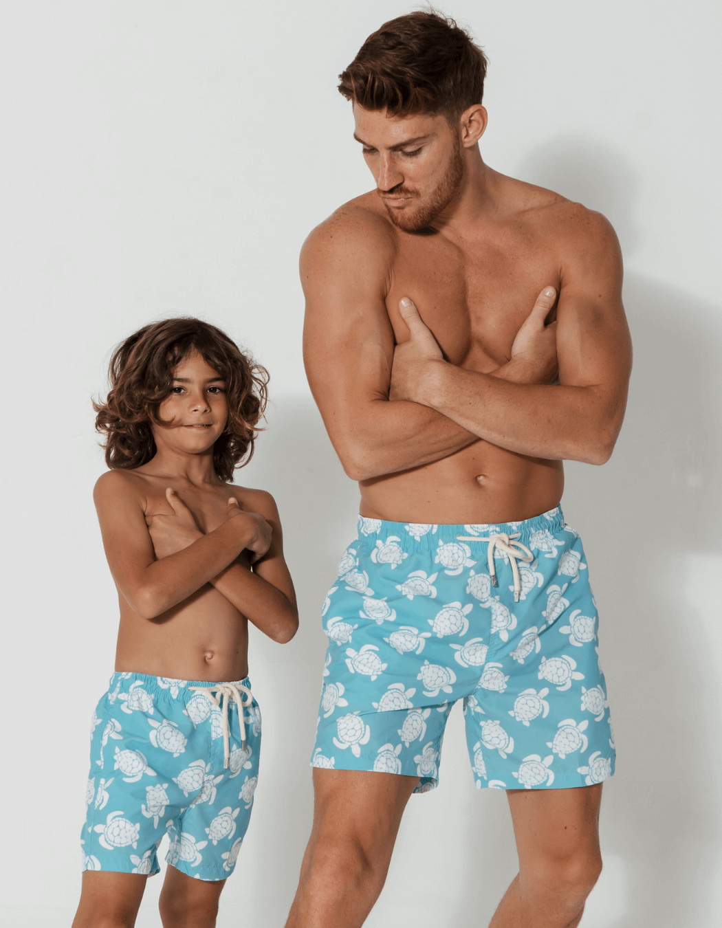 Father & Son Swim Shorts Maldives Blue Turtle, front view. Father and son matching swim shorts.
