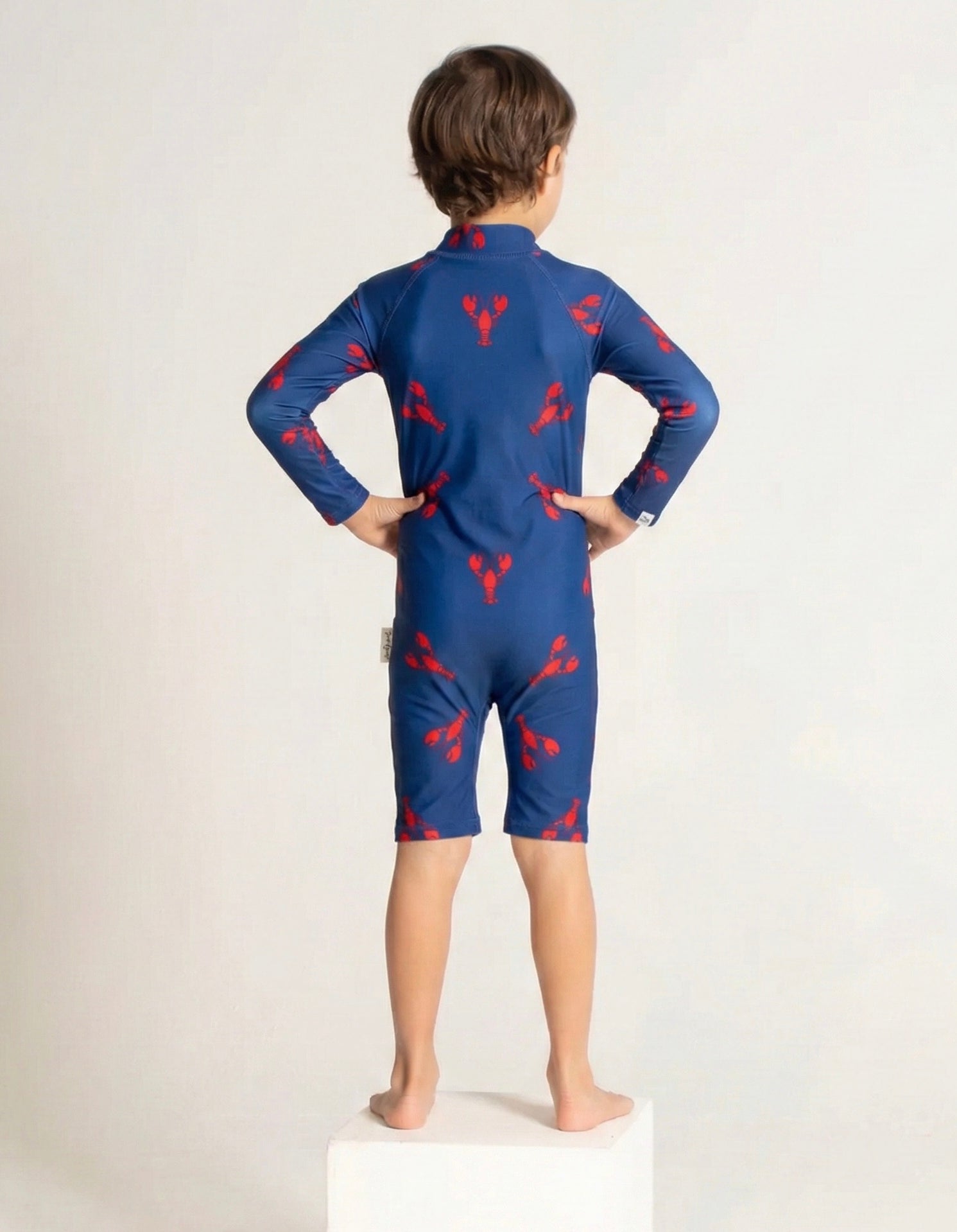 Lobster Kids Body Suit, back view. Sustainable kids swimwear.