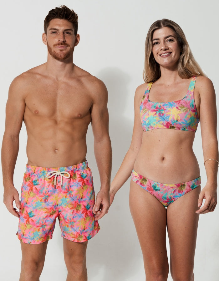 His & Hers Pink Palm, back view. Family matching swimwear.