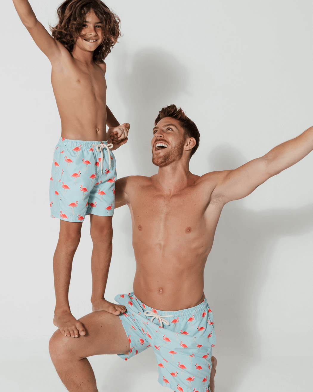 Father & Son Swim Shorts Flamingo, front view. Father and son matching swim shorts.