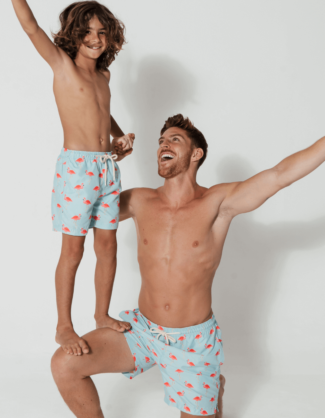 Father & Son Swim Shorts Flamingo, front view. Father and son matching swim shorts.