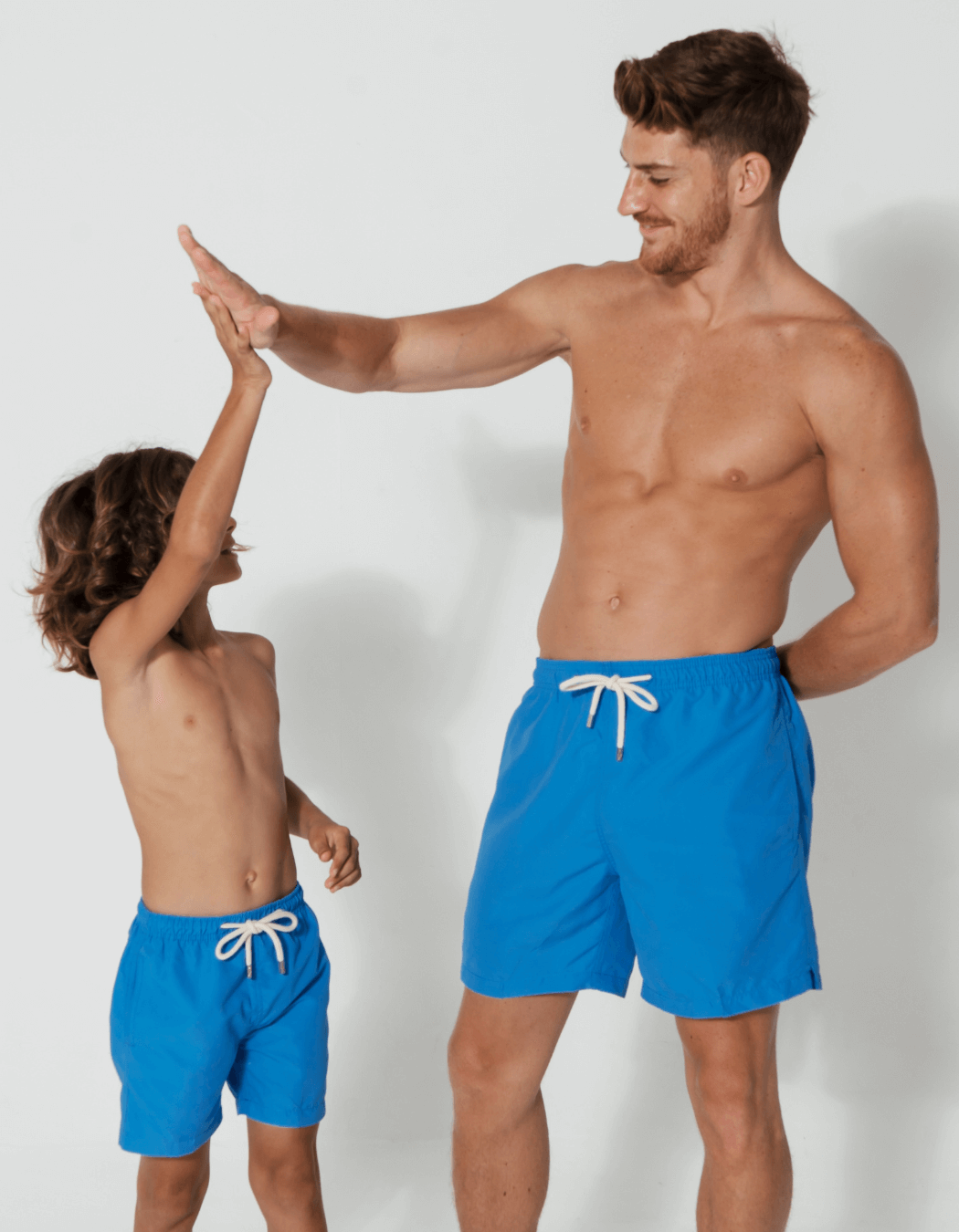 Father & Son Swim Shorts Coastal Blue, front view. Father and son matching swim shorts.