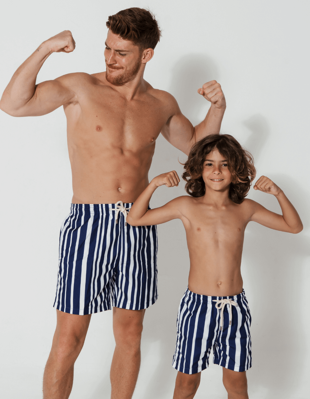 Father & Son Swim Shorts Blue & White Striped, front view. Father and son matching swim shorts.