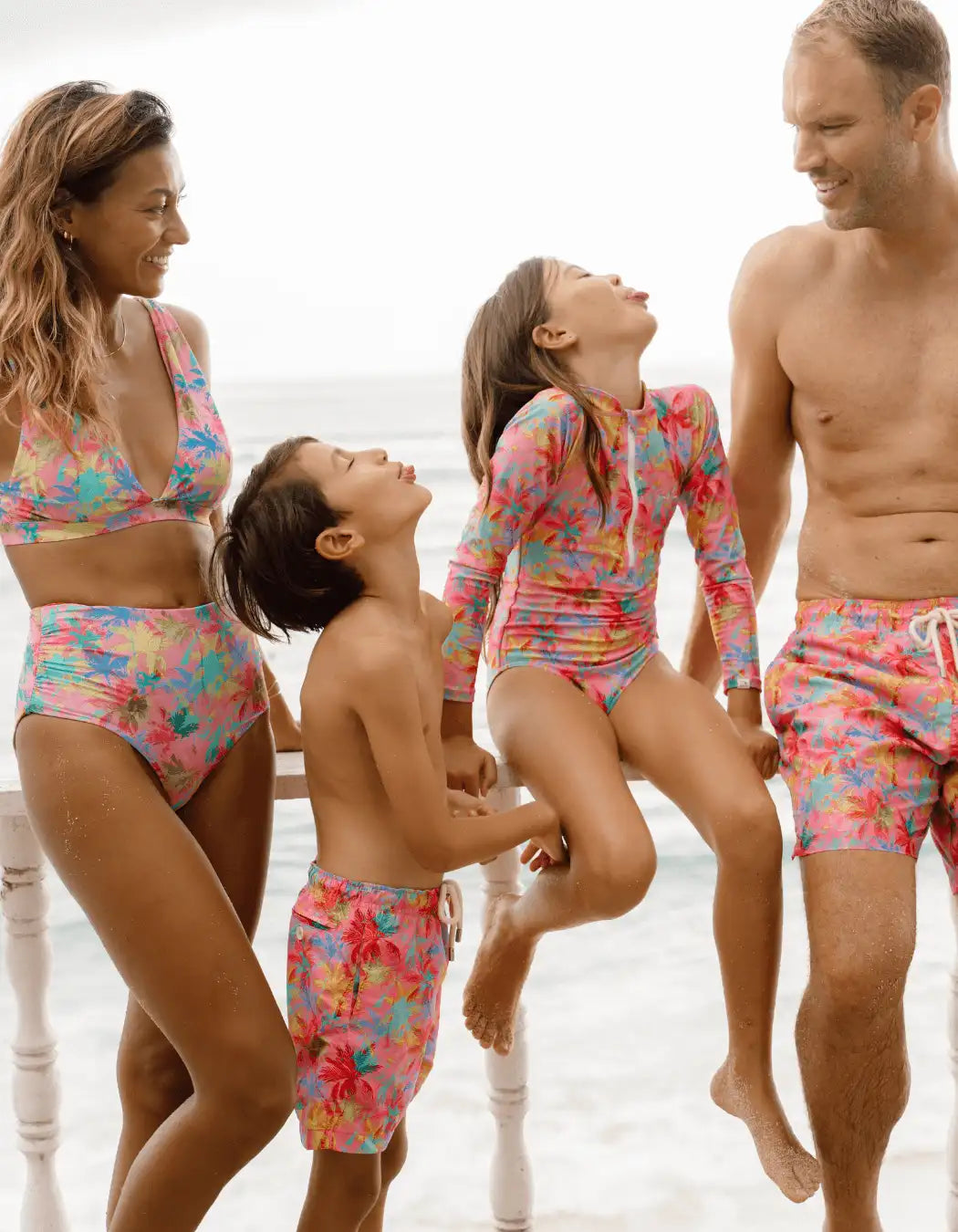 Family Matching Pink Palm, front view. Family matching swimwear.