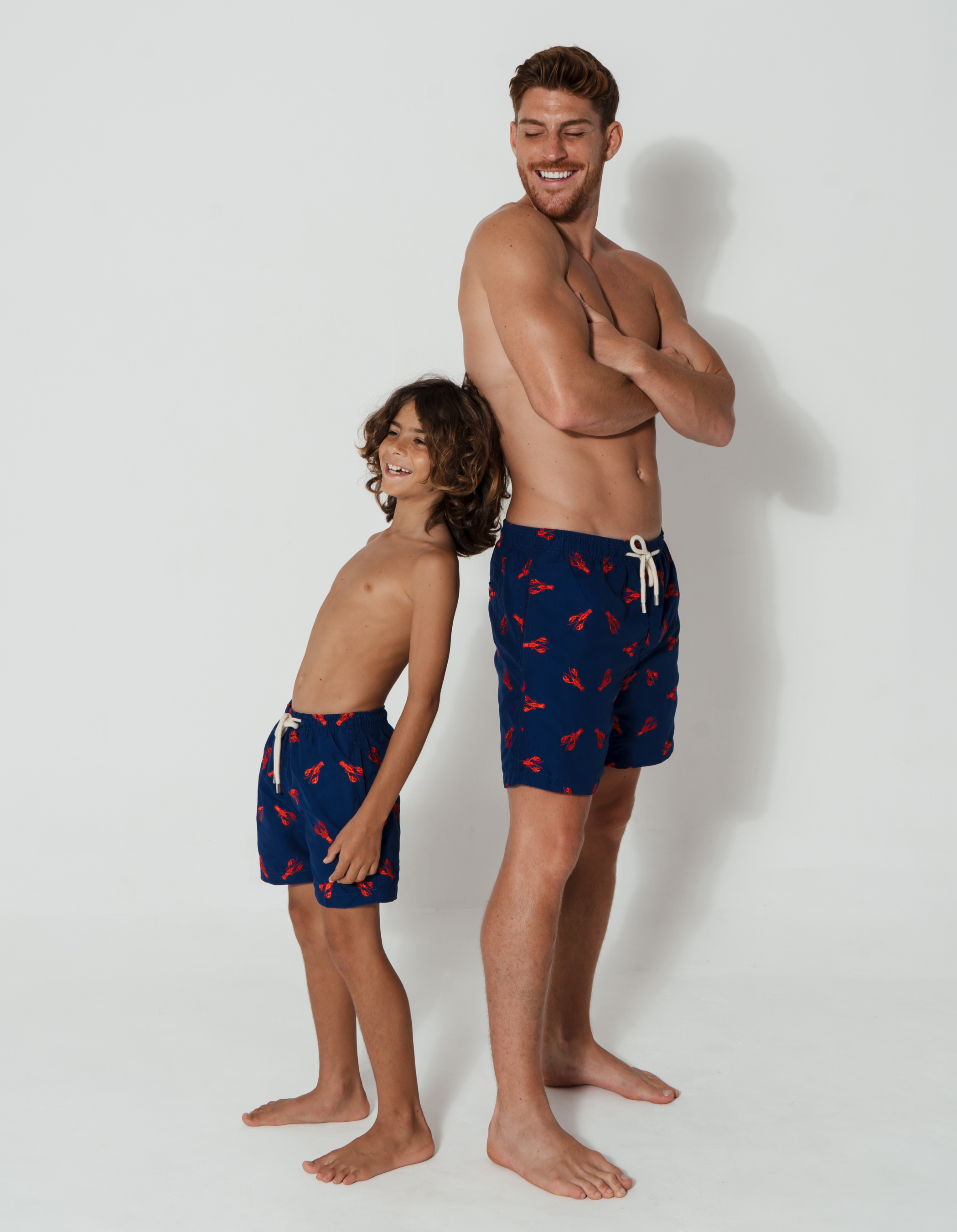 Embroidered Red Lobster Boys Swim Shorts, print detail. Embroidered kids swim shorts.