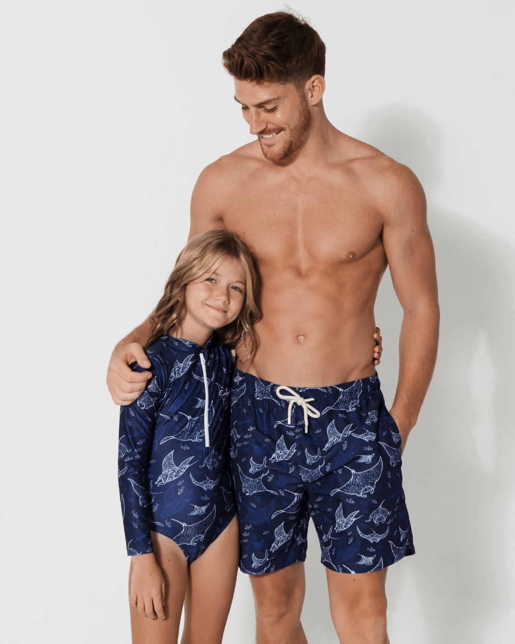 Father & Daughter Ocean Manta, front view. Father and son matching swim shorts.