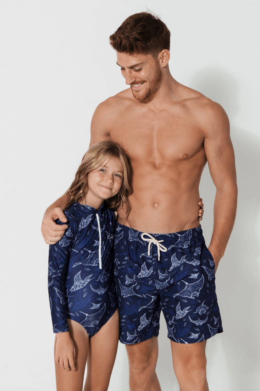 Father & Daughter Ocean Manta, front view. Father and son matching swim shorts.