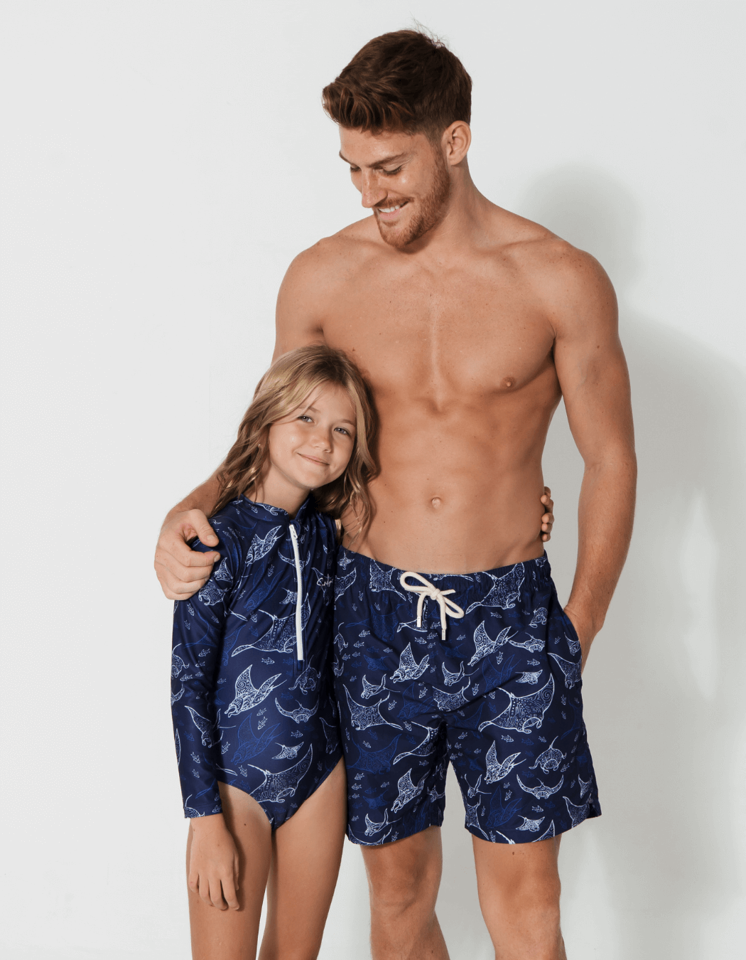 Father & Daughter Ocean Manta, front view. Father and son matching swim shorts.