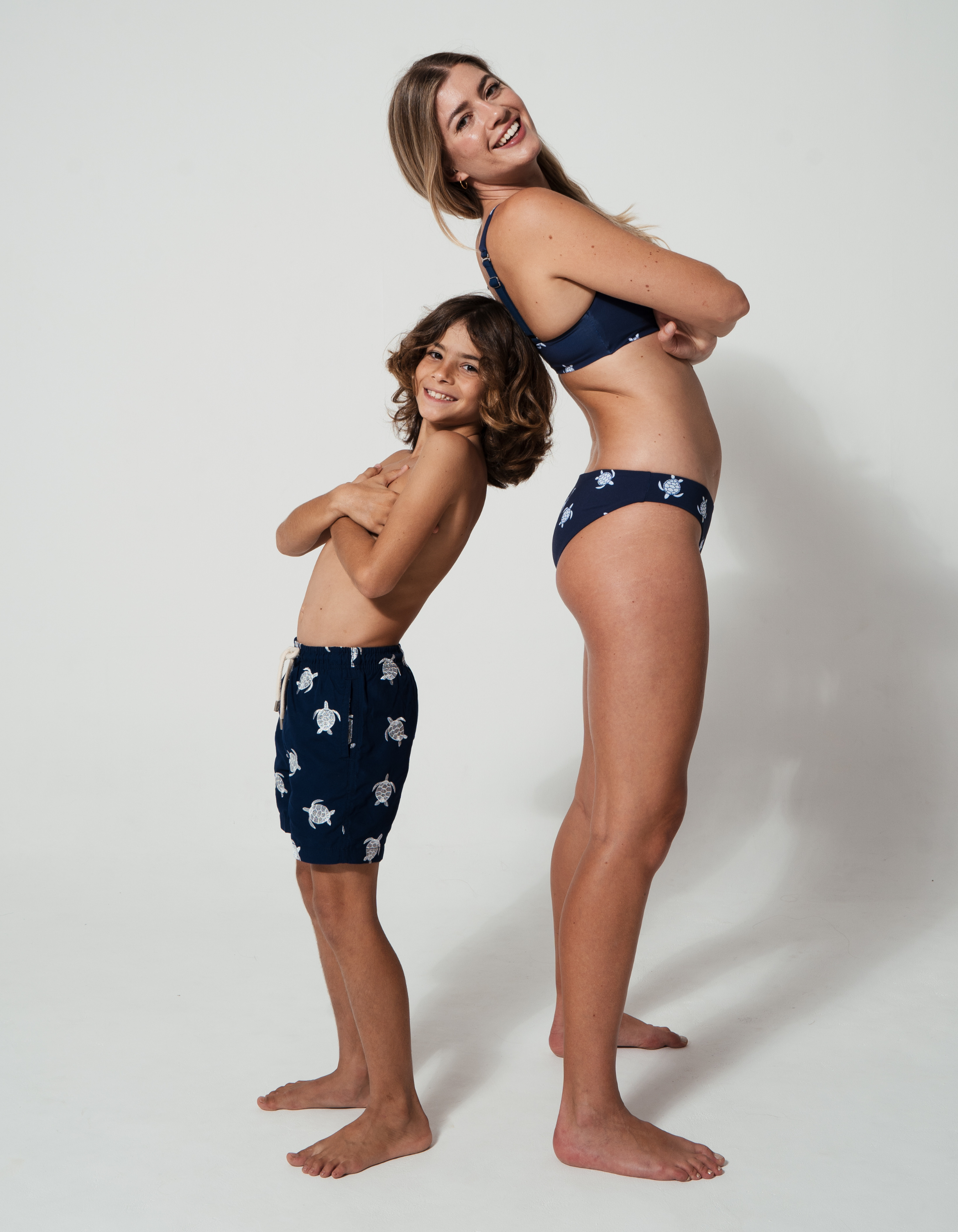 Embroidered Turtle Boys Swim Shorts, lifestyle shot. Embroidered kids swim shorts.