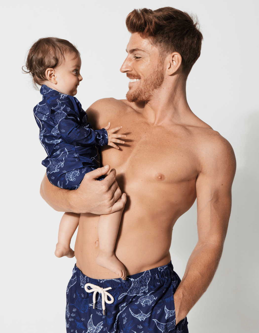 Father & Baby Ocean Manta, front view. Father and son matching swim shorts.