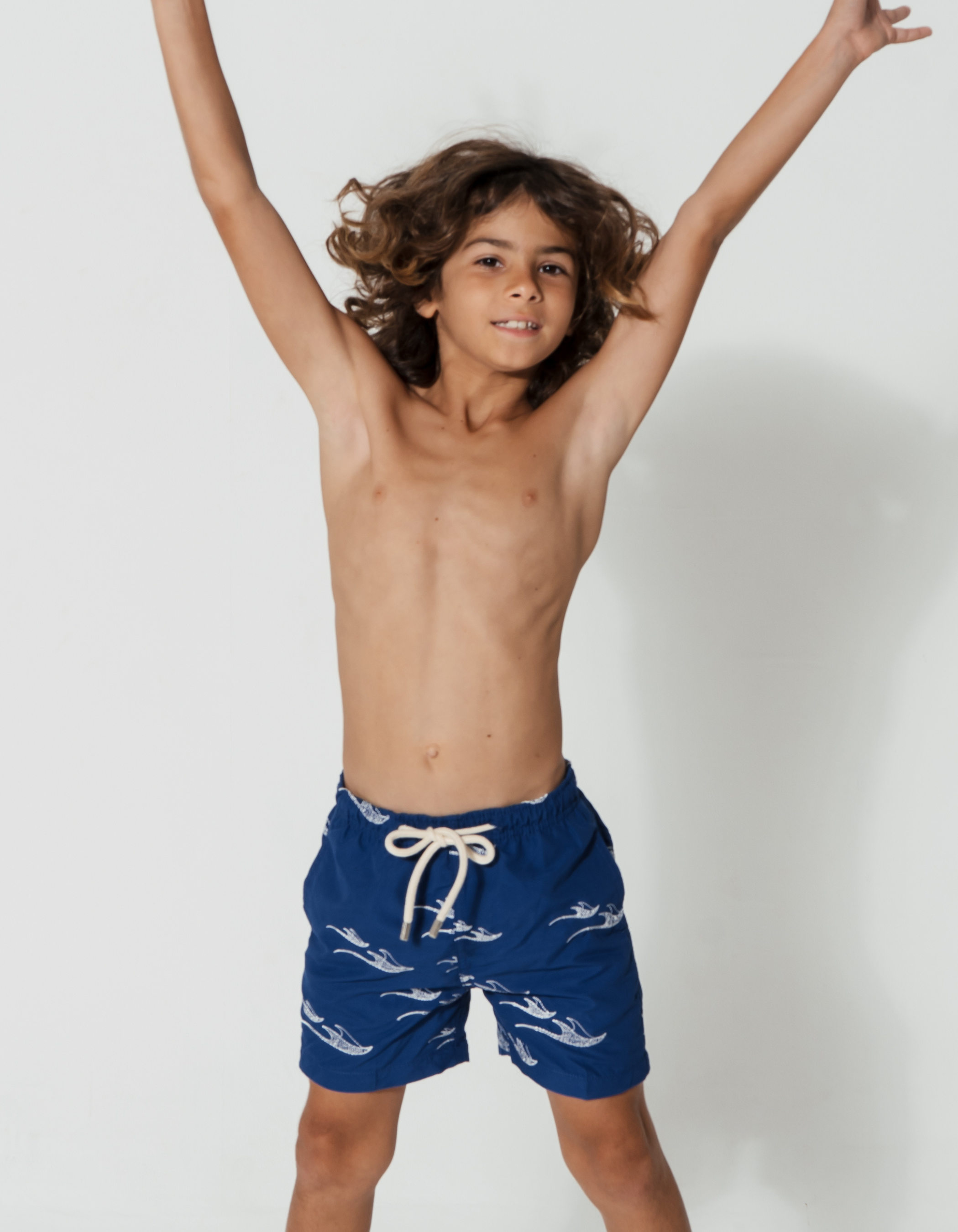 Embroidered Manta Boys Swim Shorts, front view. Embroidered kids swim shorts.