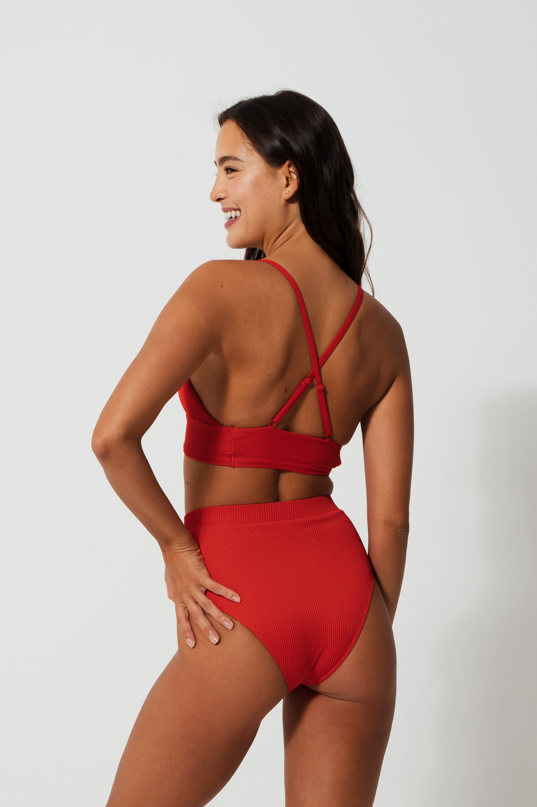 Flores Lipstick Red Womens Ribbed Plunge Bikini Top, additional view. Sustainable womens swimwear.