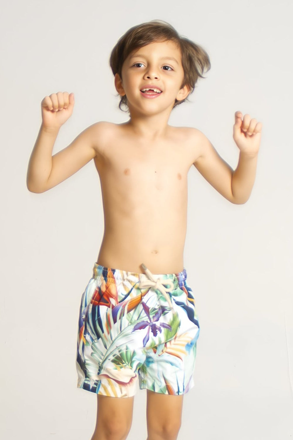 Bird of Paradise Boys Swim Shorts, front view. Sustainable boys swimwear.