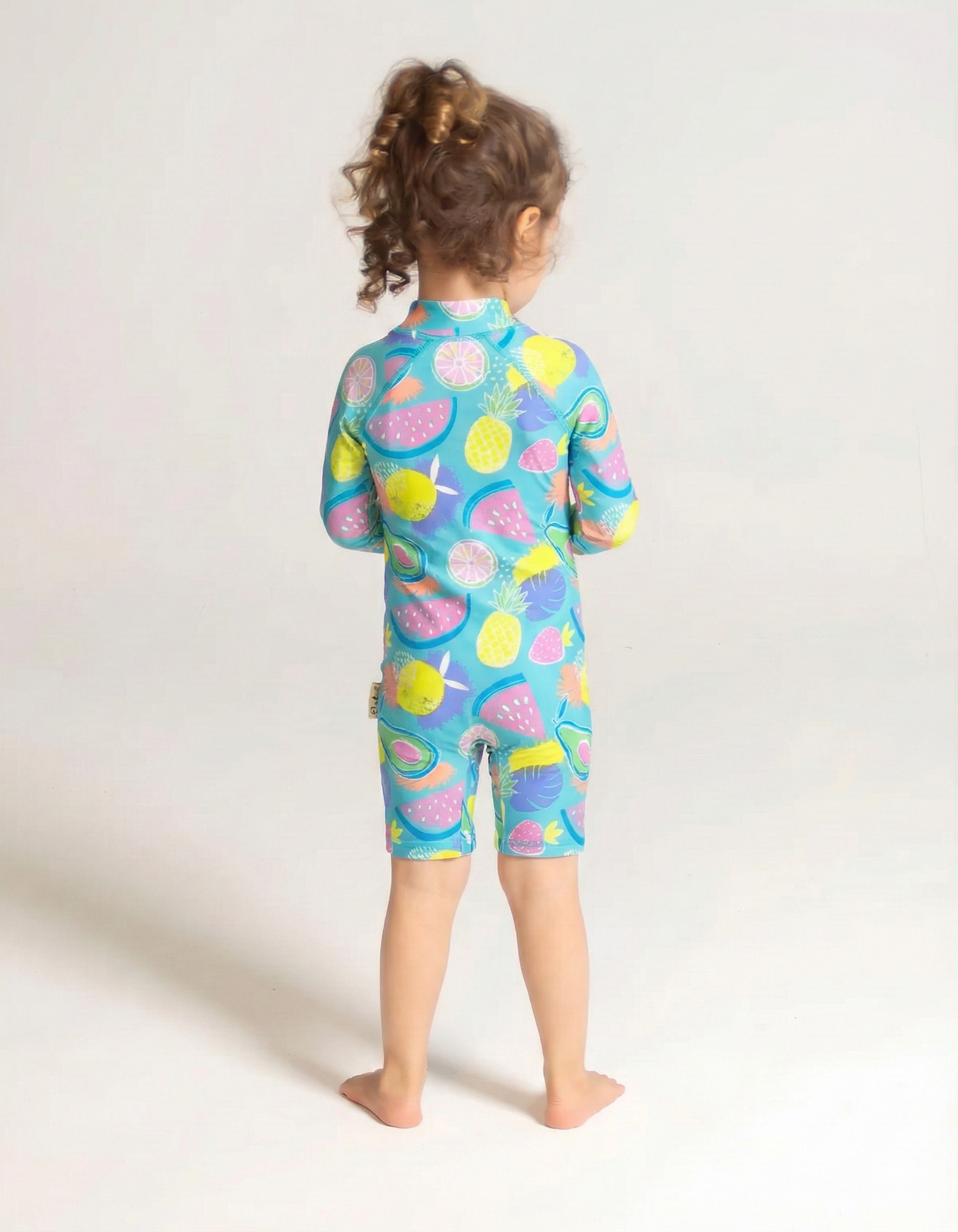 Tropicana Kids Body Suit, back view. Sustainable kids swimwear.