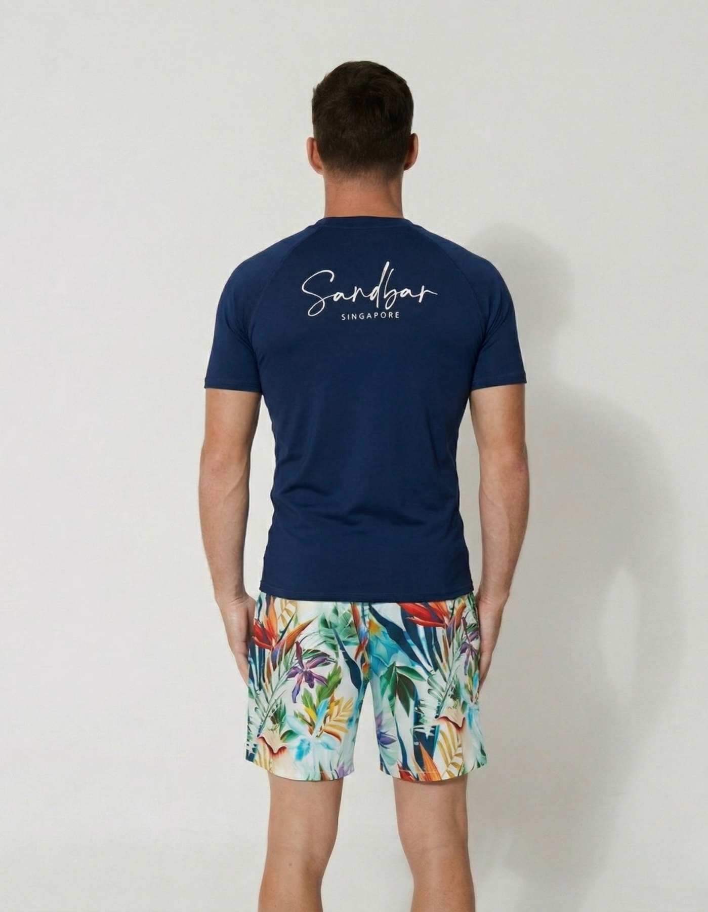 Deep Blue Short Sleeved Mens Rash Guard, back view. Mens UPF50 rash guard.
