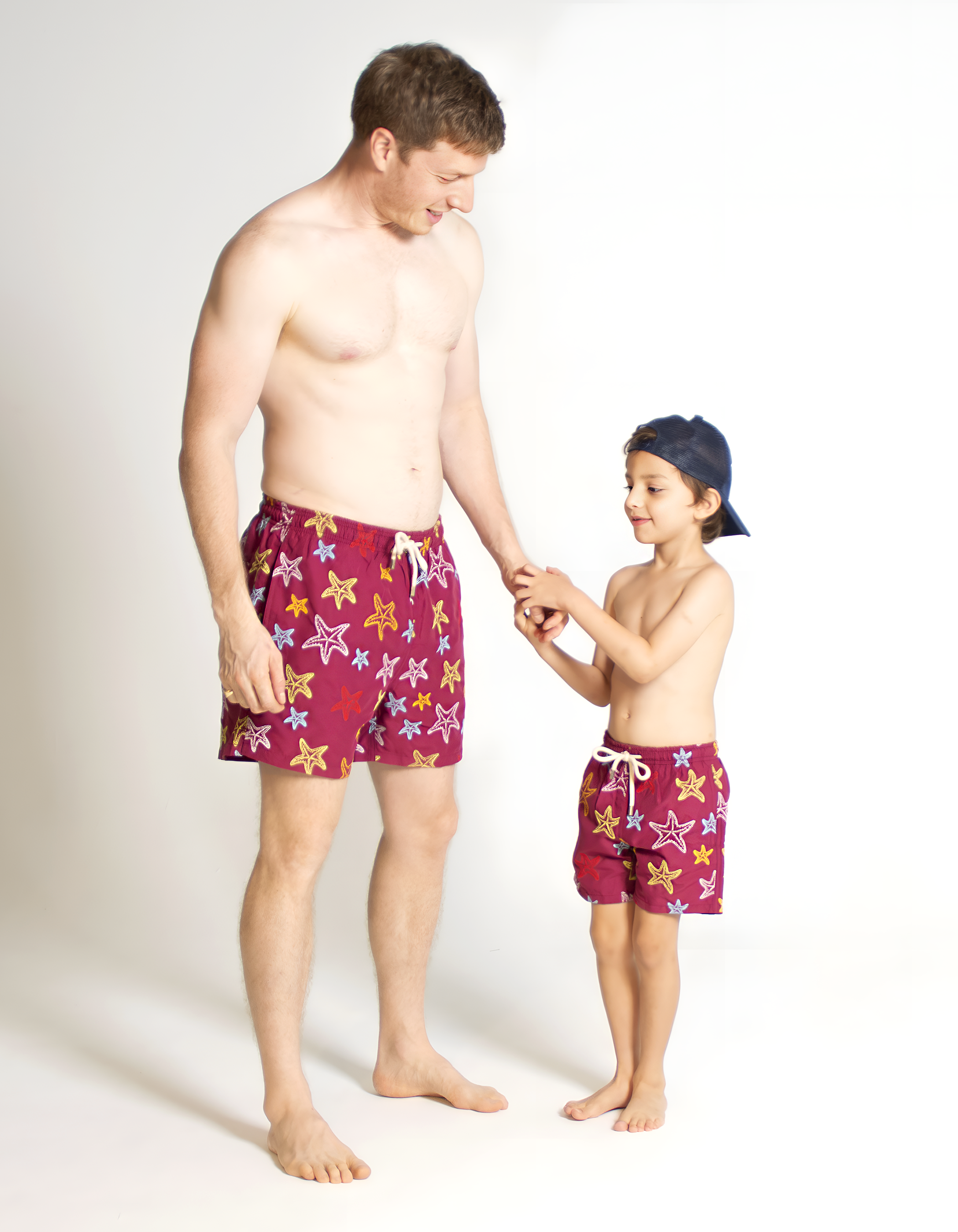 Embroidered Starfish Boys Swim Shorts, front view. Embroidered kids swim shorts.