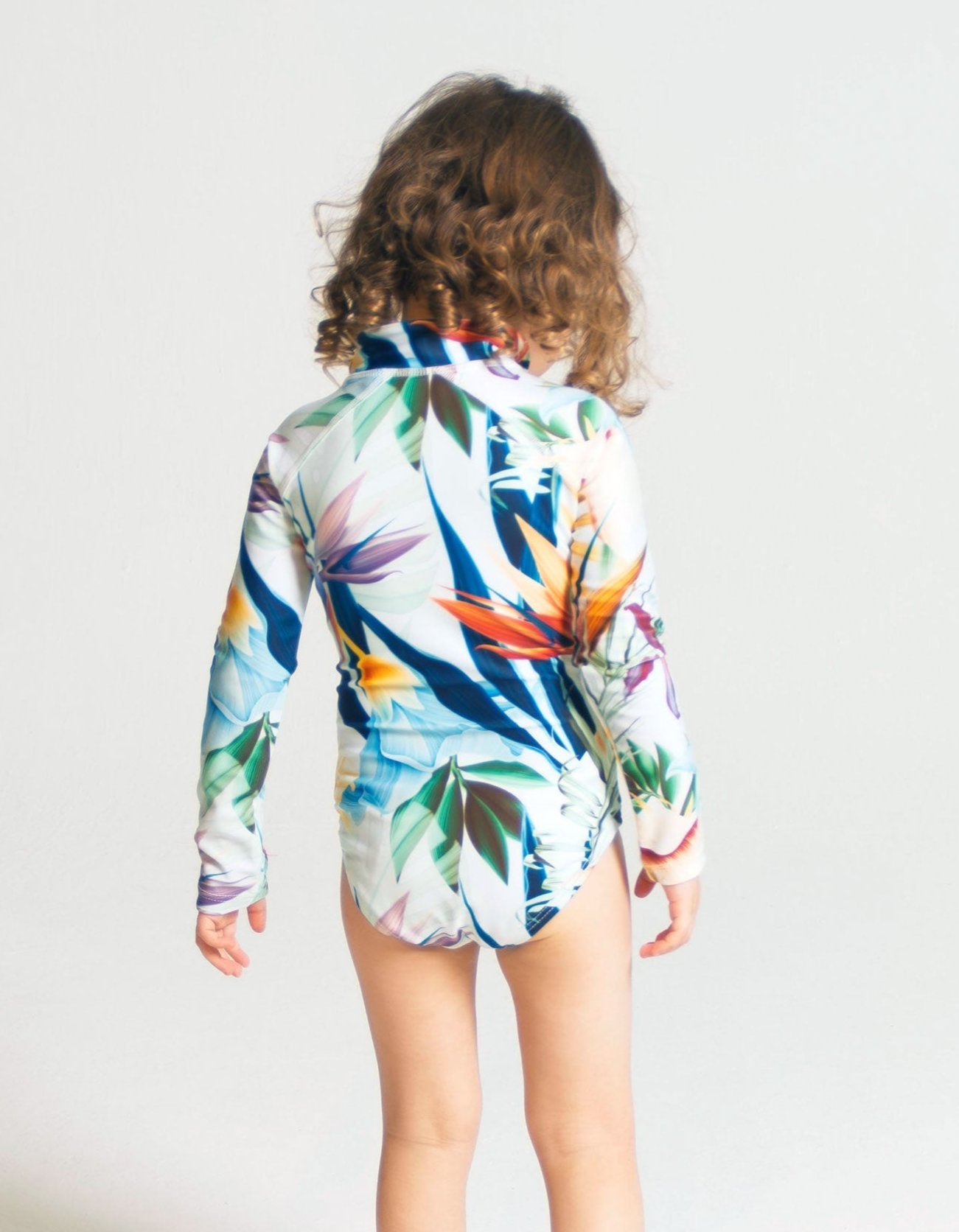 Bird of Paradise Long Sleeved Girls Swimsuit, back view. Sustainable girls swimwear.