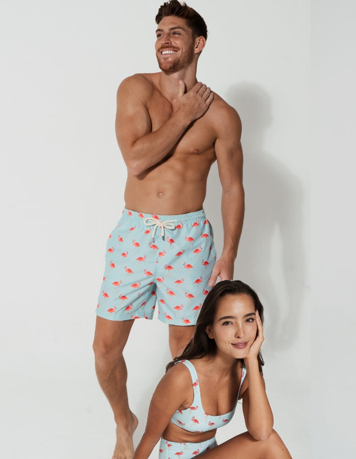 His & Hers Pink Flamingo, back view. Family matching swimwear.