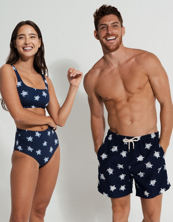 His & Hers Blue Turtle, back view. Family matching swimwear.