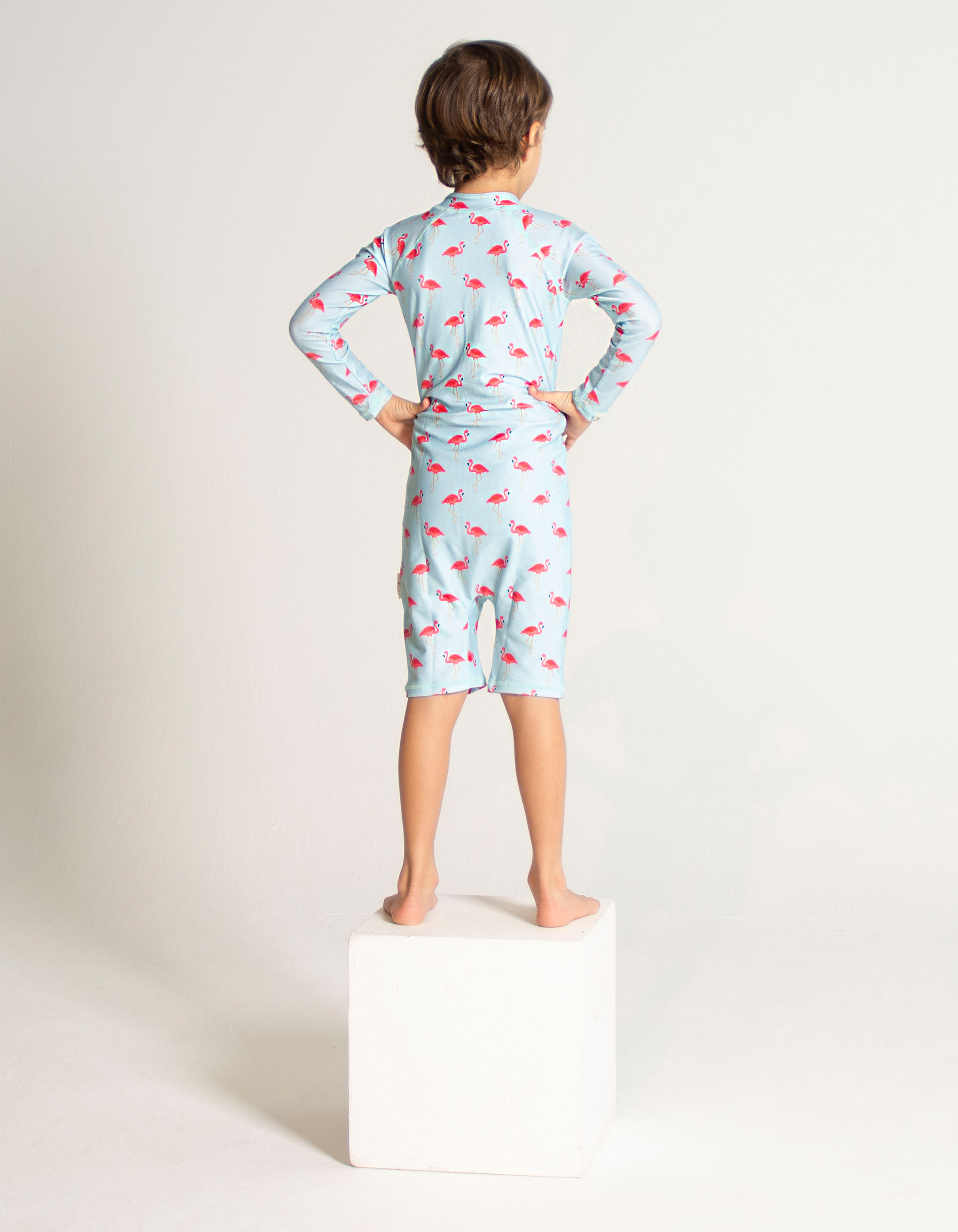 Pink Flamingo Kids Body Suit, back view. Sustainable kids swimwear.