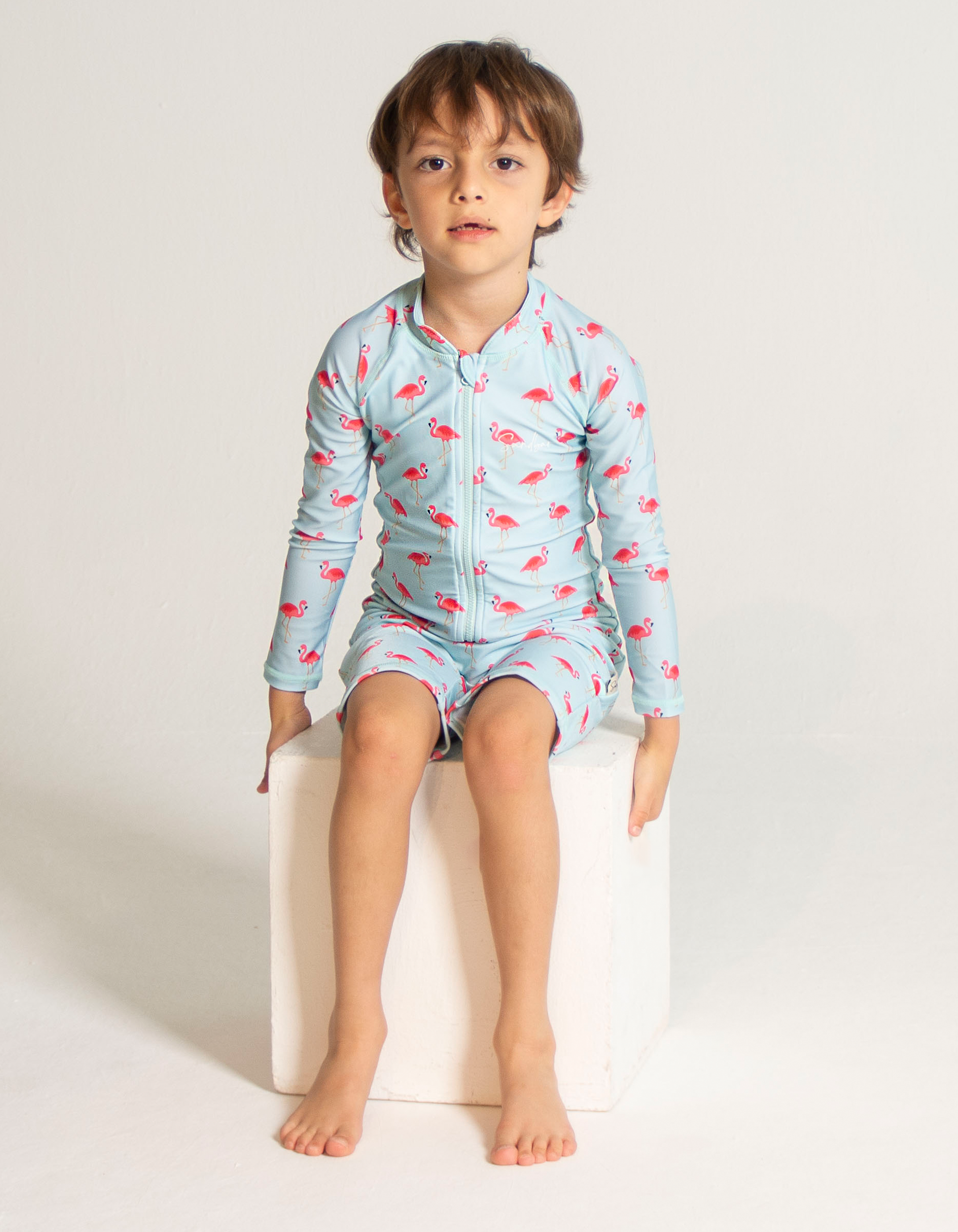 Pink Flamingo Kids Body Suit, front view. Sustainable kids swimwear.
