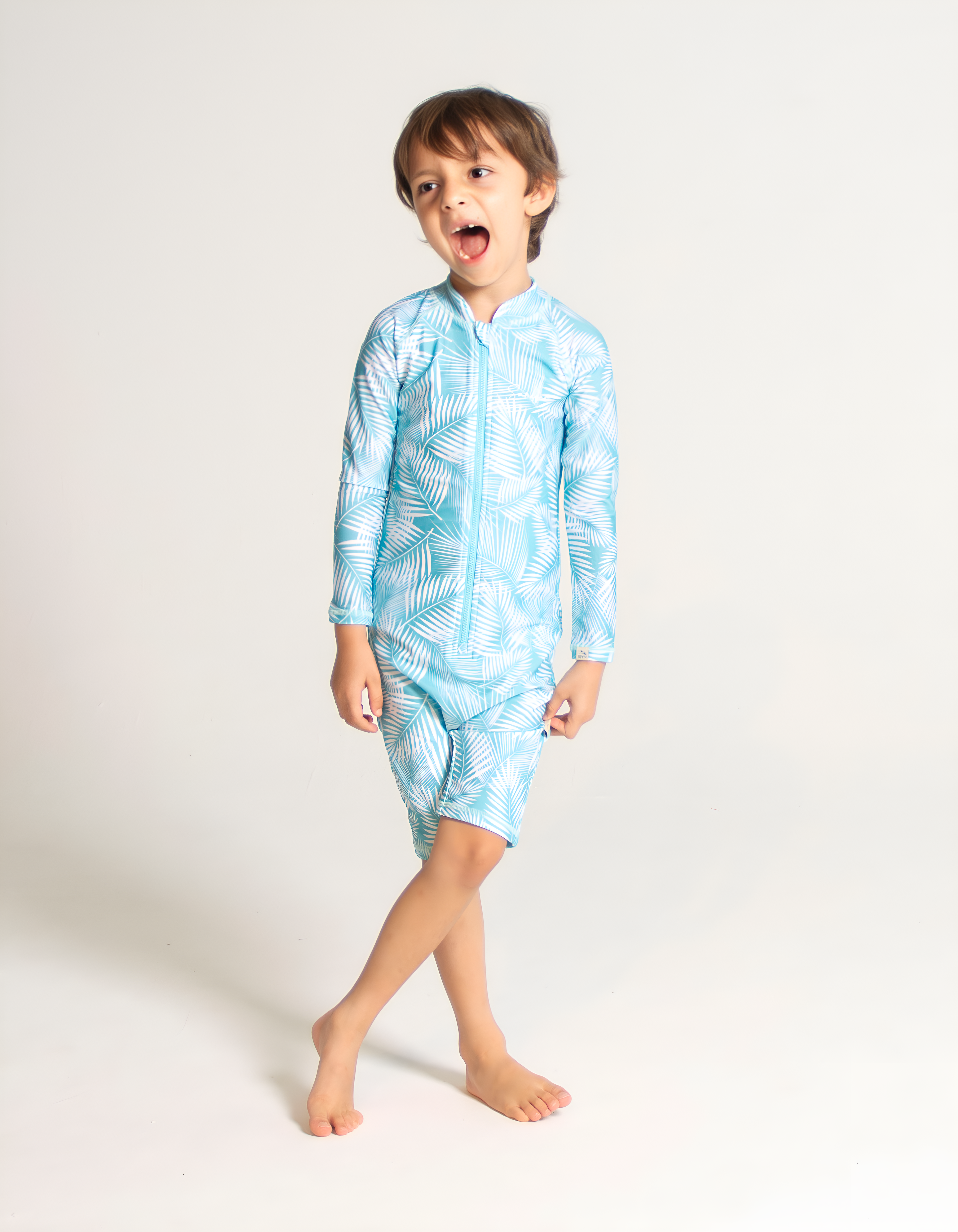 Green Fern Kids Body Suit, front view. Sustainable kids swimwear.