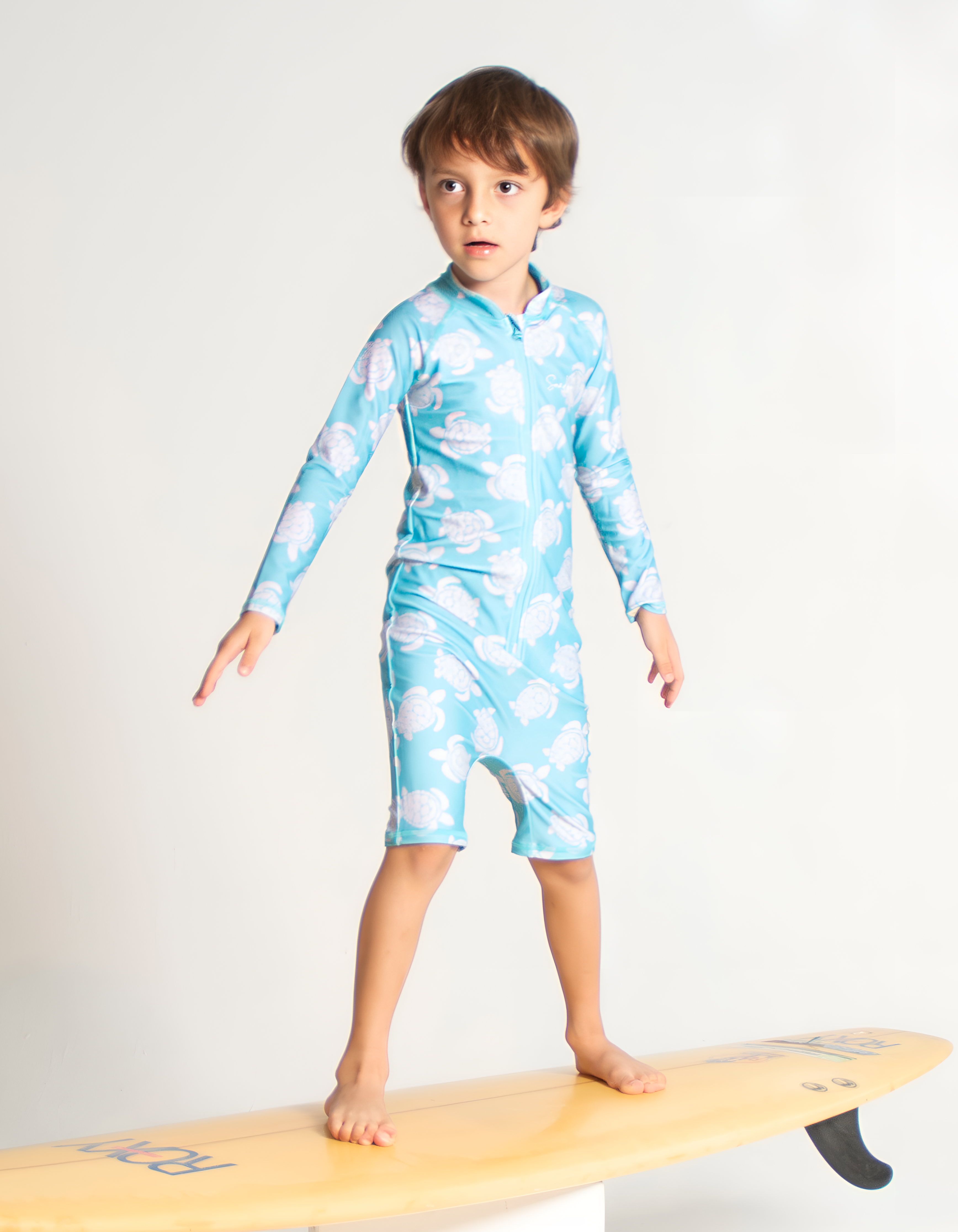 Maldives Blue Turtle Kids Body Suit, front view. Sustainable kids swimwear.