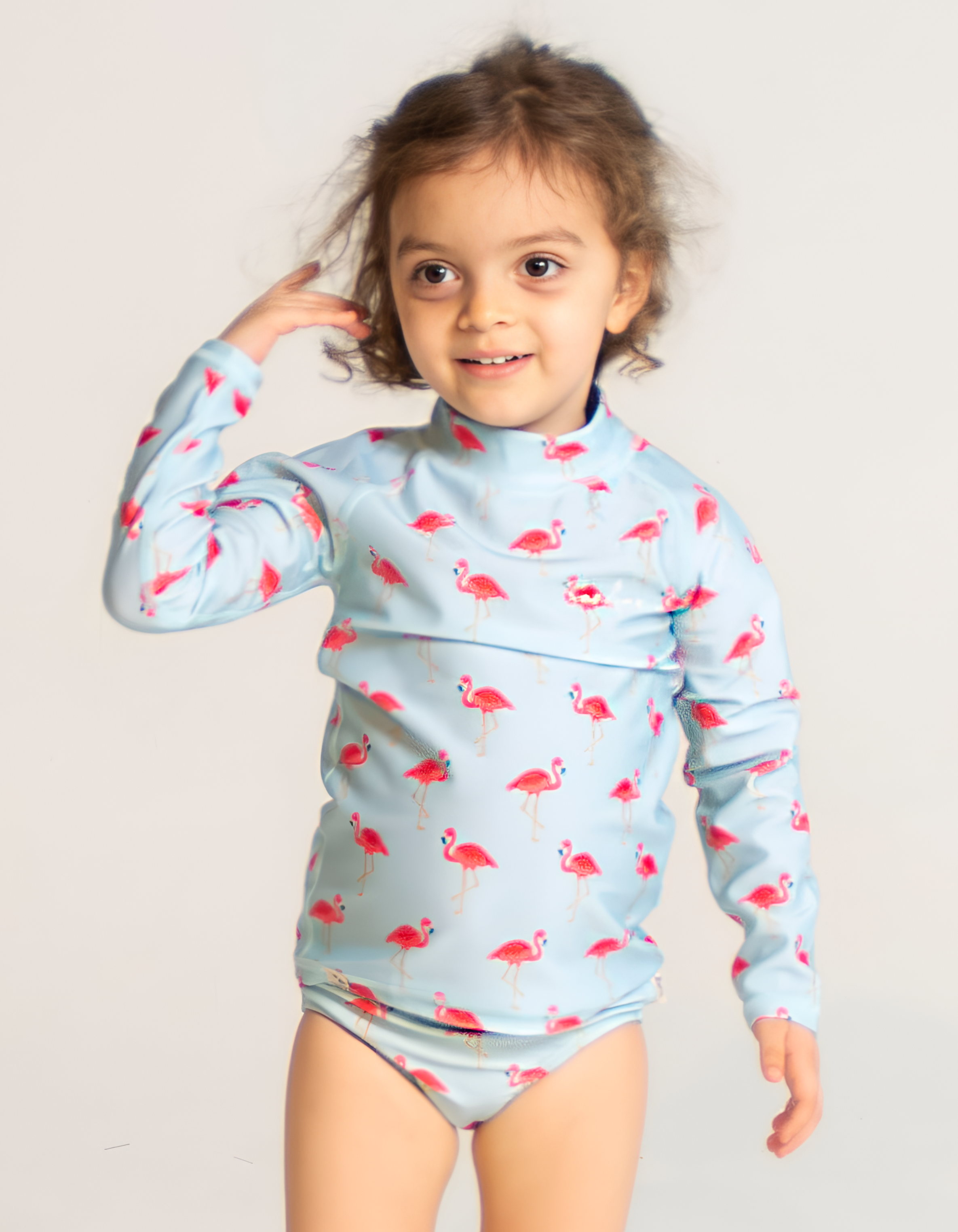 Pink Flamingo Girls Bikini Bottoms, front view. Sustainable girls swimwear.