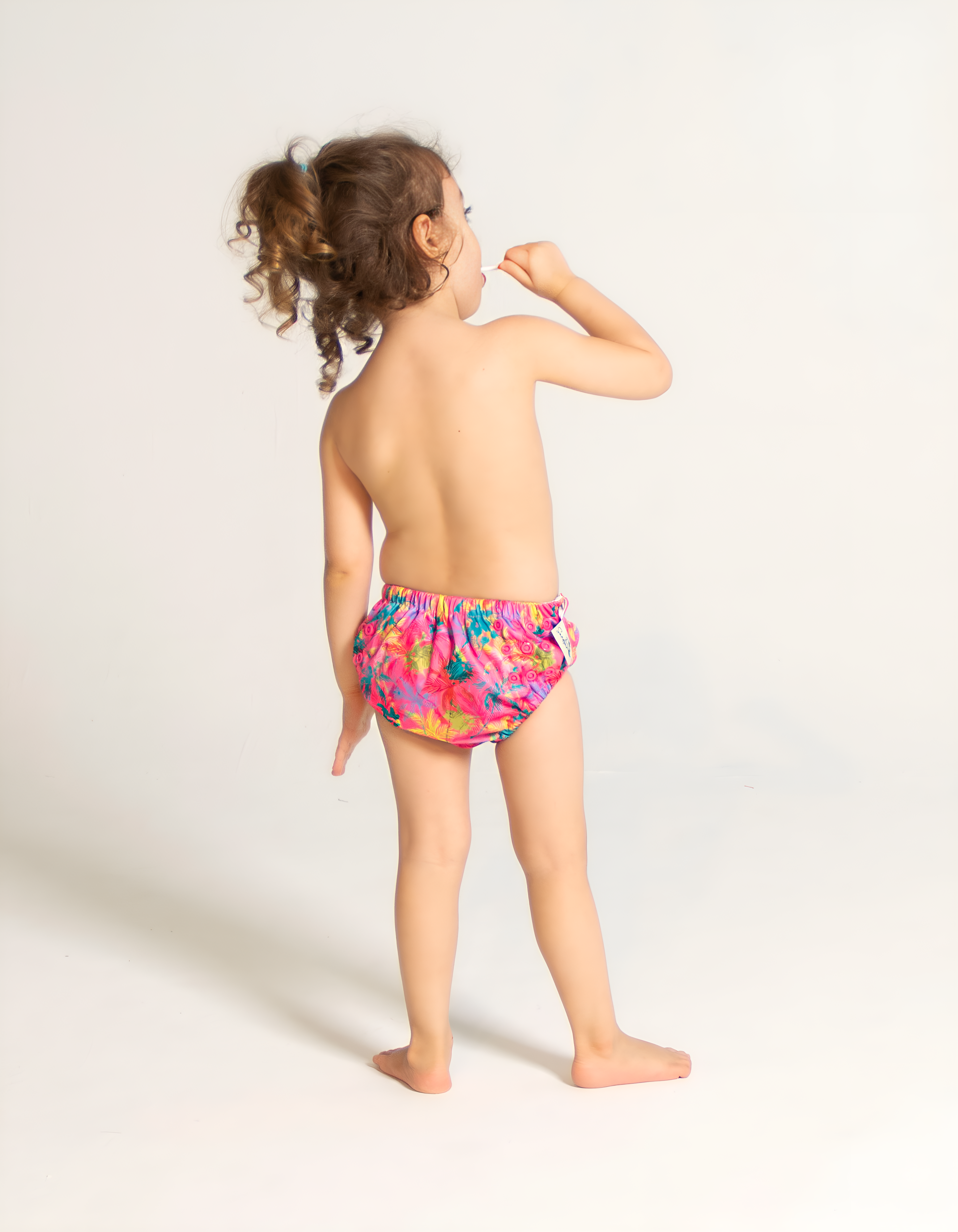 Pink Palm Reusable Swim Diaper, back view. Reusable swim diaper.