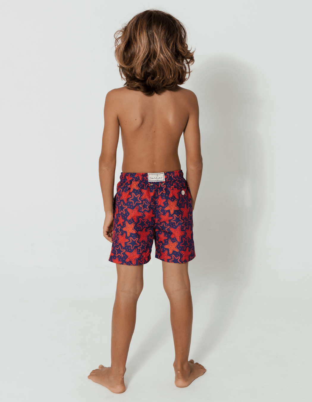 Red Starfish Boys Swim Shorts, additional view. Sustainable boys swimwear.