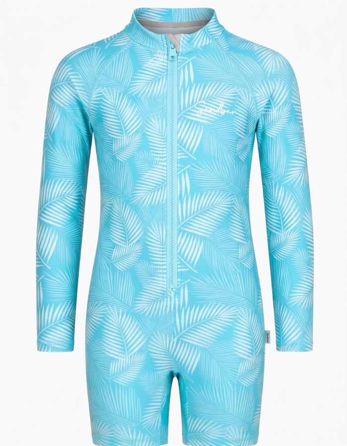 A children's full-body one-piece swimsuit or rash guard in bright turquoise blue with a white palm leaf pattern, featuring a front zipper, high collar, and short legs.