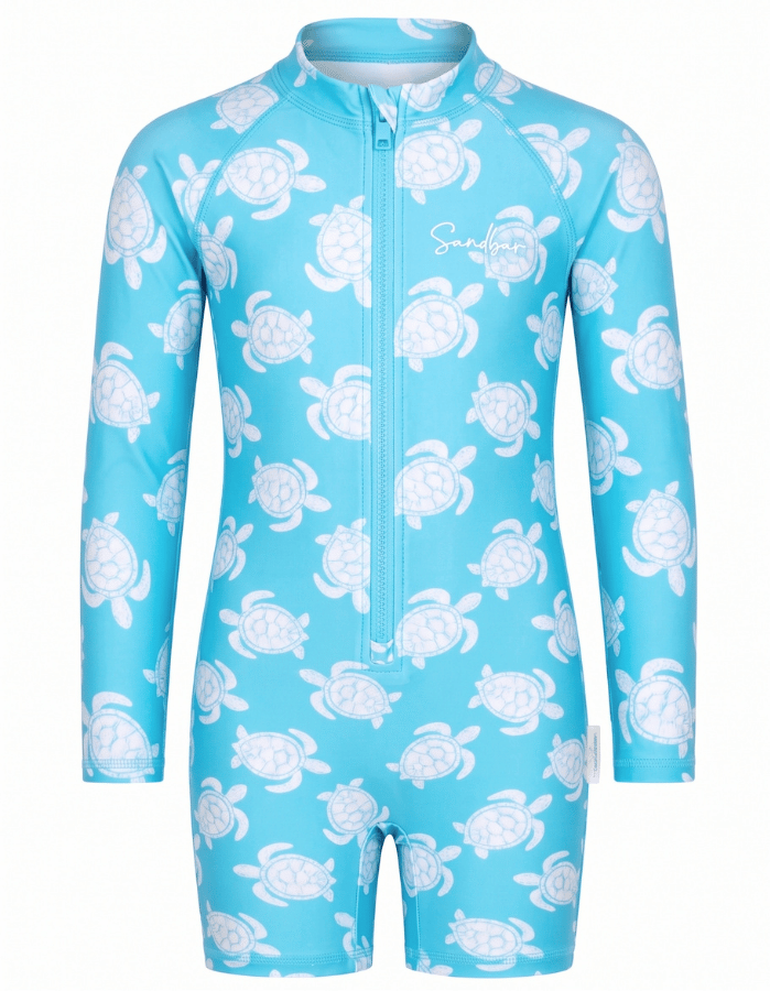 A light blue long-sleeve one-piece swimsuit with a white turtle pattern, featuring a front zipper and a small 'Sunfish' brand logo on the chest.