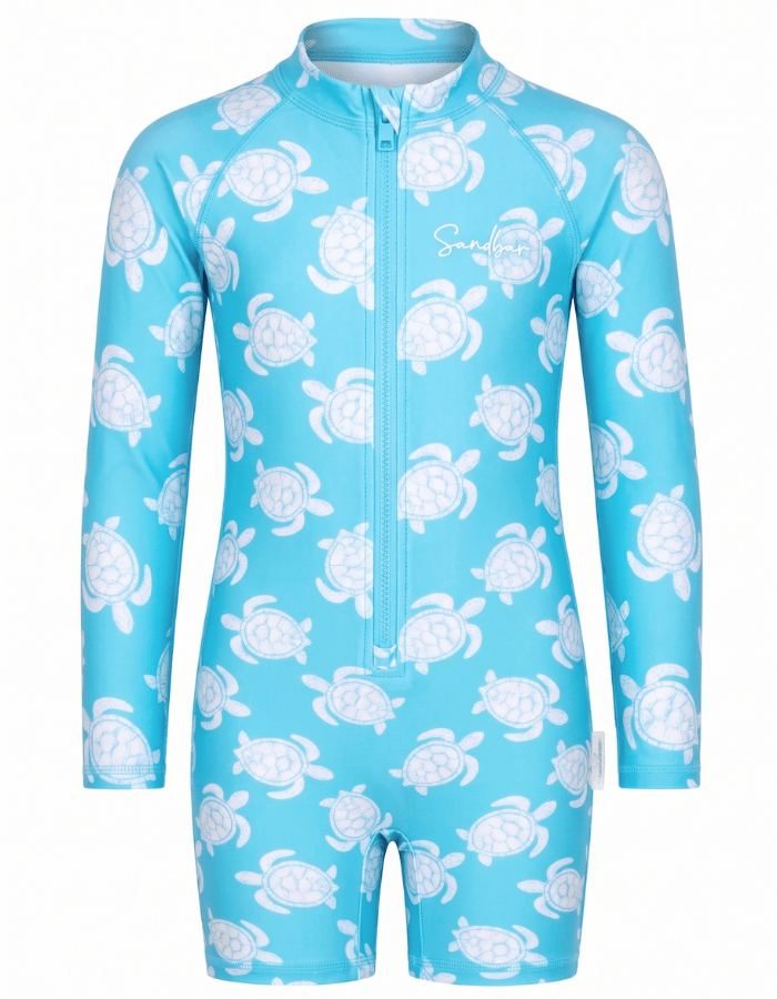 A light blue long-sleeve one-piece swimsuit with a white turtle pattern, featuring a front zipper and a small 'Sunfish' brand logo on the chest.