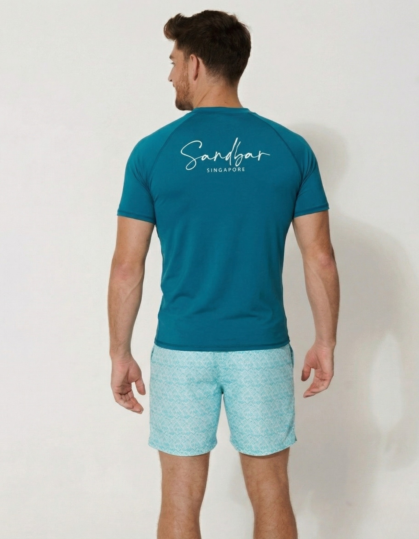 Teal Short Sleeved Mens Rash Guard, back view. Mens UPF50 rash guard.