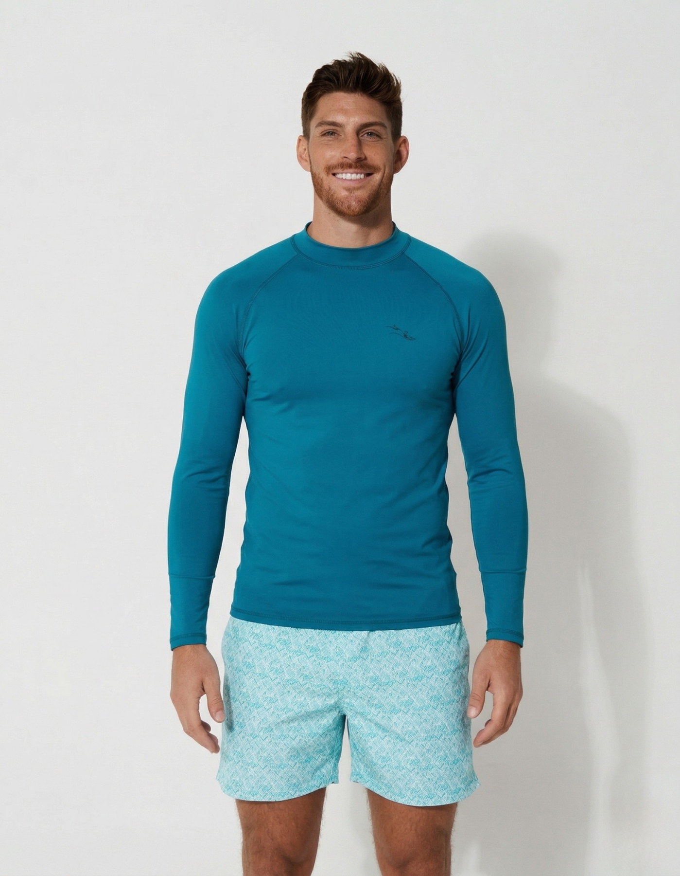 Teal Long Sleeved Mens Rash Guard, front view. Mens UPF50 rash guard.