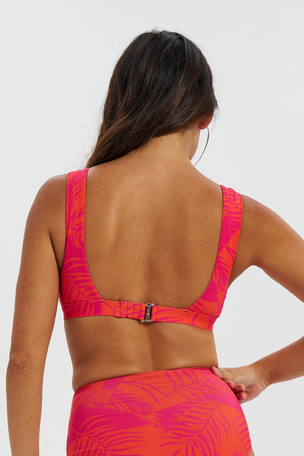 Dune – Aperol Palm Womens Plunge Bikini Top, back view. Sustainable womens swimwear.