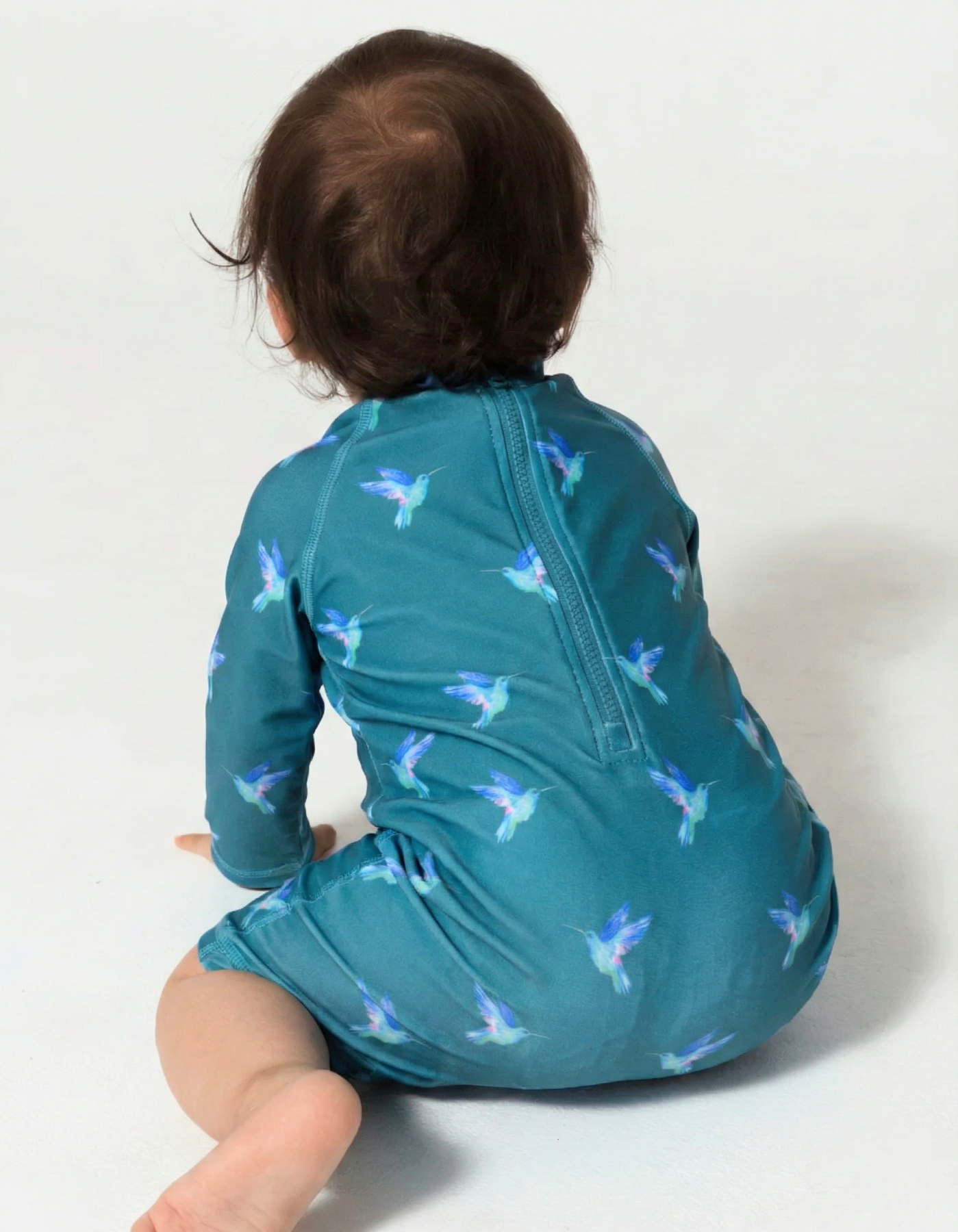 Hummingbird Baby Swimsuit, back view. Sustainable baby swimwear.