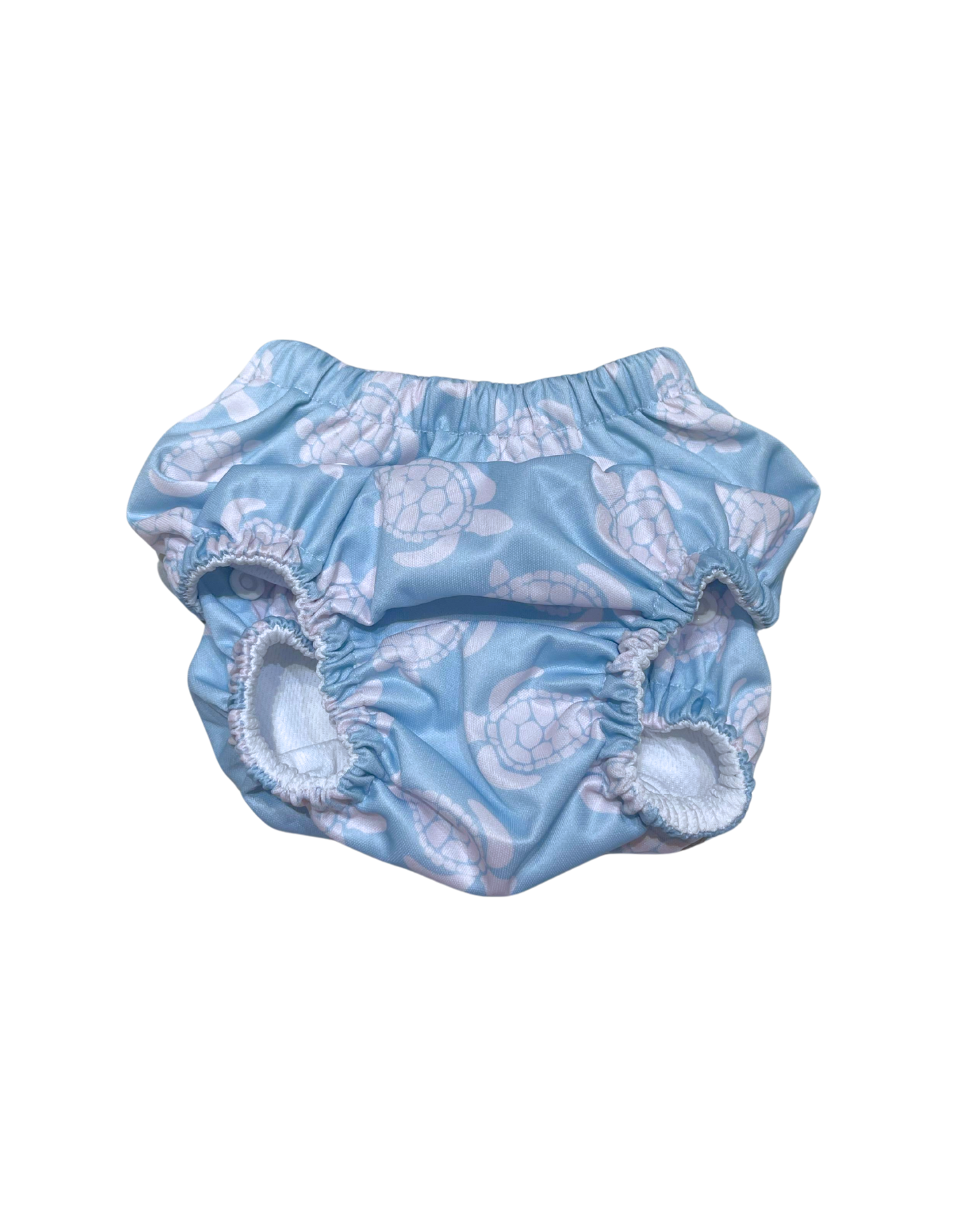 Maldives Blue Turtle Reusable Swim Diaper, lifestyle shot. Reusable swim diaper.