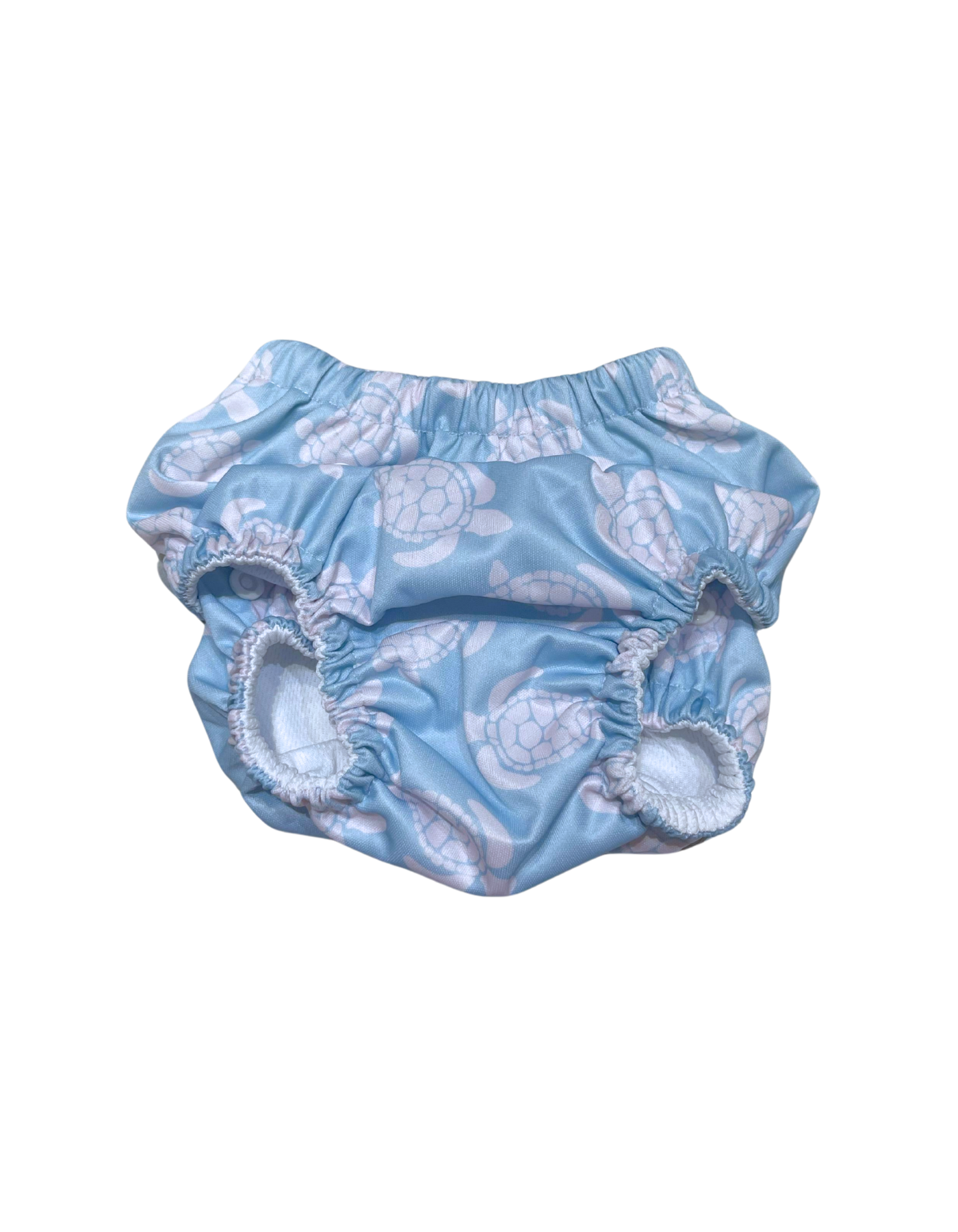 Maldives Blue Turtle Reusable Swim Diaper, lifestyle shot. Reusable swim diaper.