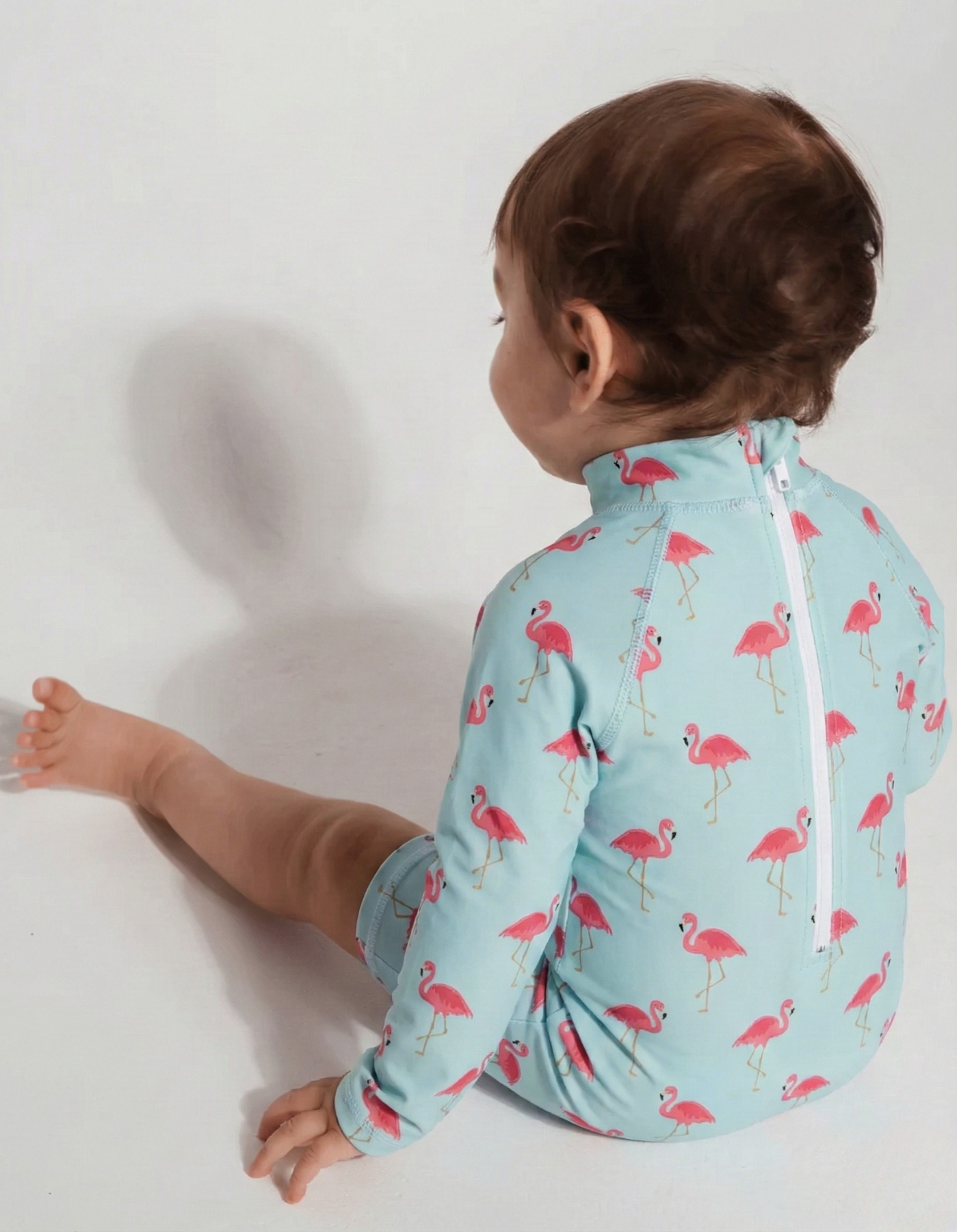 Pink Flamingo Baby Swimsuit, back view. Sustainable baby swimwear.